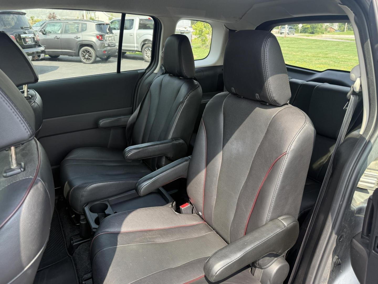 2015 Silver /Black Mazda MAZDA5 Grand Touring (JM1CW2DL0F0) with an 2.5L I4 DOHC 16V engine, 5-Speed Automatic transmission, located at 11115 Chardon Rd. , Chardon, OH, 44024, (440) 214-9705, 41.580246, -81.241943 - This 2015 Mazda Mazda 5 with a 2.5L I4 engine and 5-speed automatic transmission offers a versatile and comfortable minivan, achieving approximately 29 MPG highway. It features a leather interior, second-row captain’s seats, heated front seats, automatic climate control, a power moonroof, dusk-sen - Photo#30