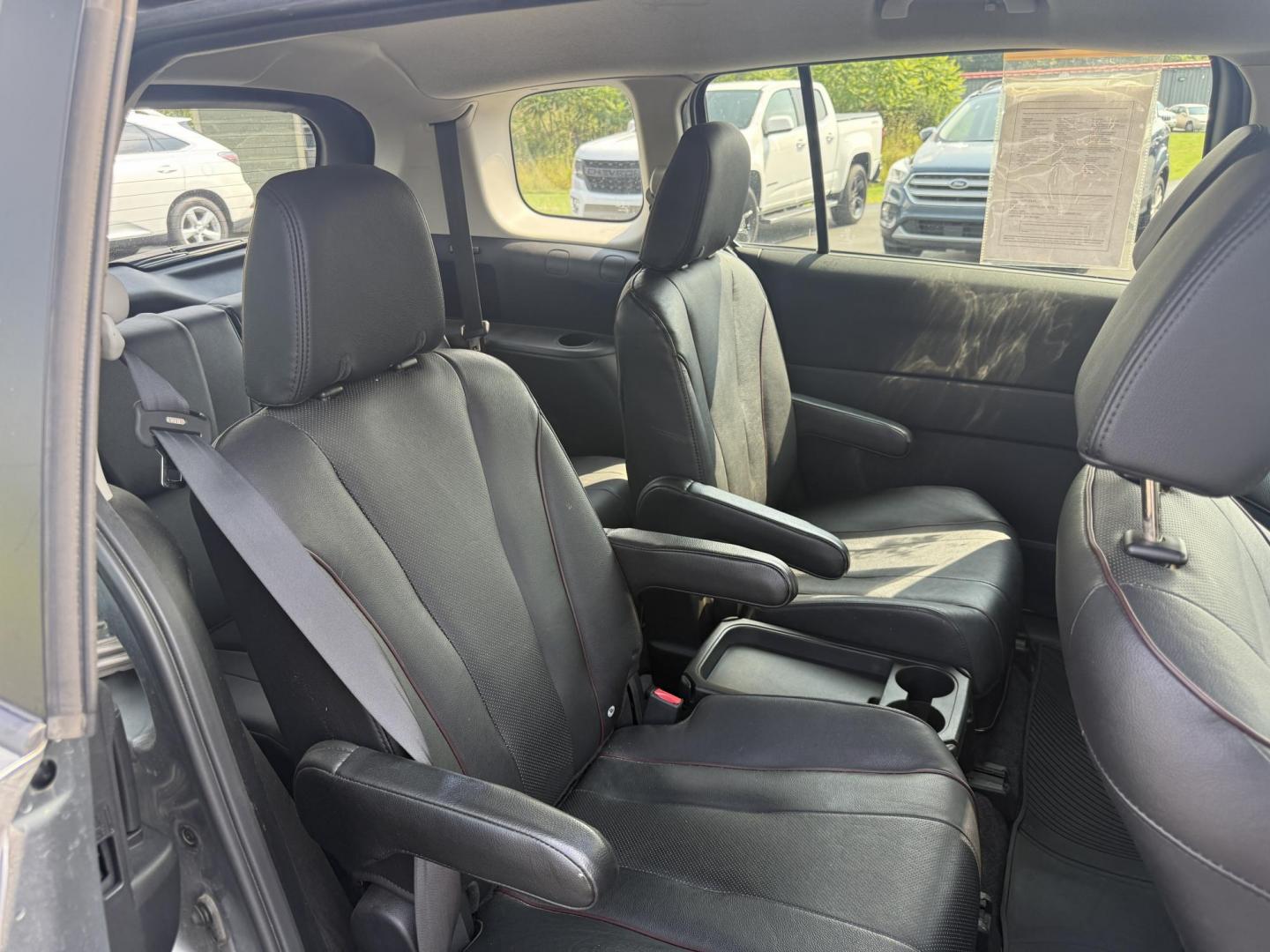 2015 Silver /Black Mazda MAZDA5 Grand Touring (JM1CW2DL0F0) with an 2.5L I4 DOHC 16V engine, 5-Speed Automatic transmission, located at 11115 Chardon Rd. , Chardon, OH, 44024, (440) 214-9705, 41.580246, -81.241943 - This 2015 Mazda Mazda 5 with a 2.5L I4 engine and 5-speed automatic transmission offers a versatile and comfortable minivan, achieving approximately 29 MPG highway. It features a leather interior, second-row captain’s seats, heated front seats, automatic climate control, a power moonroof, dusk-sen - Photo#35