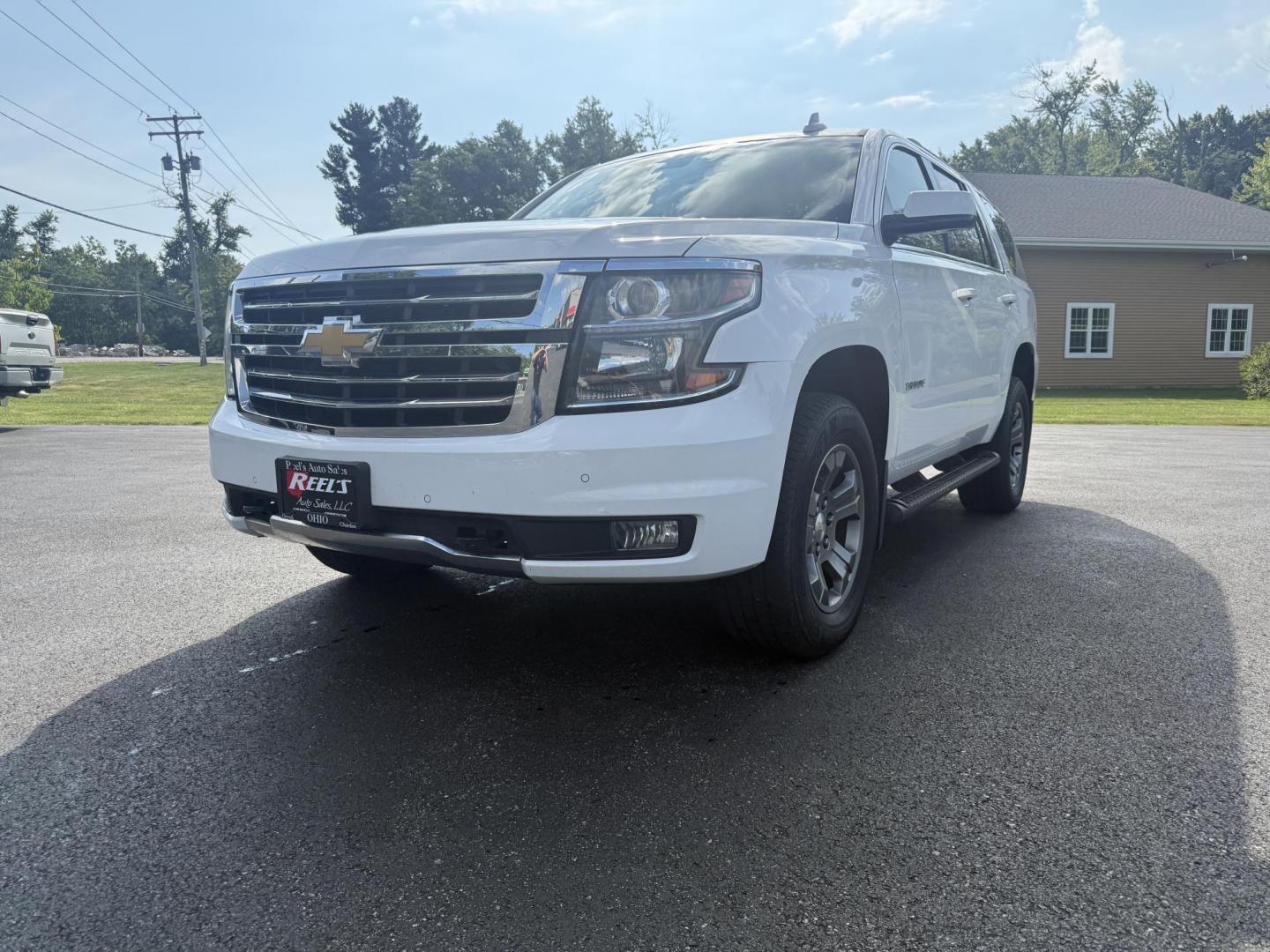 2016 White /Black Chevrolet Tahoe LT 4WD (1GNSKBKCXGR) with an 5.3L V8 OHV 16V engine, 6A transmission, located at 11115 Chardon Rd. , Chardon, OH, 44024, (440) 214-9705, 41.580246, -81.241943 - This 2016 Chevrolet Tahoe LT Z71 4WD is a well-equipped full-size SUV featuring a 5.3L EcoTec V8 engine paired with a 6-speed automatic transmission and 3.42 gearing, delivering an 8,200-pound towing capacity. It boasts a luxurious leather interior with heated and power front seats, heated second-ro - Photo#0