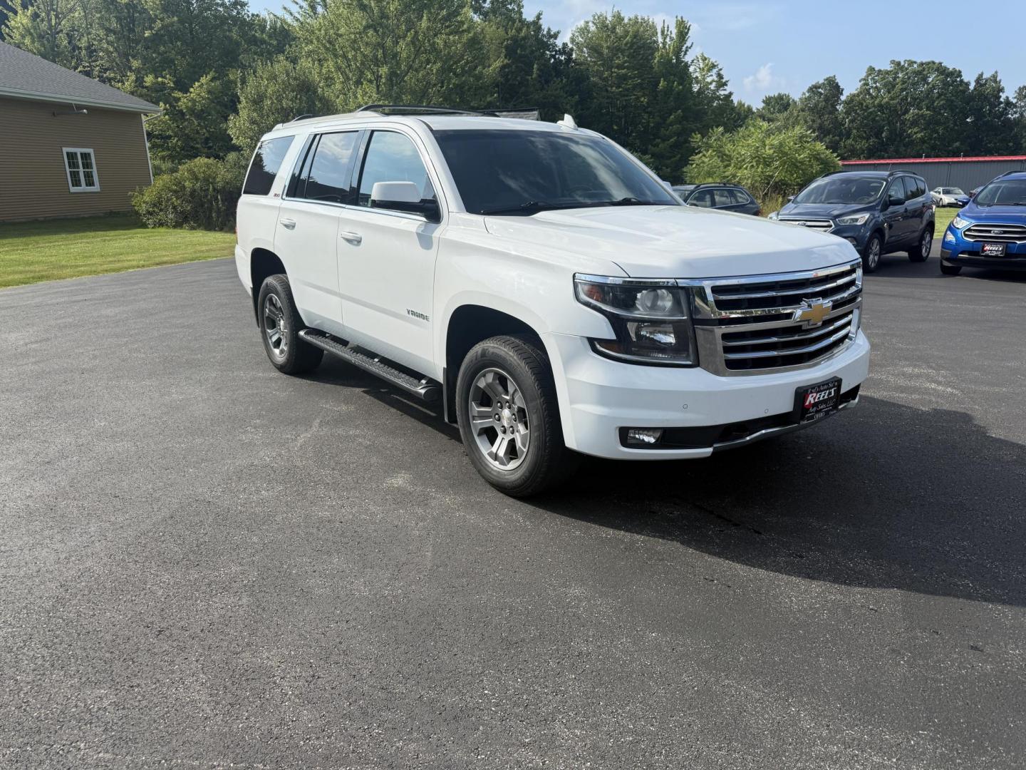 2016 White /Black Chevrolet Tahoe LT 4WD (1GNSKBKCXGR) with an 5.3L V8 OHV 16V engine, 6A transmission, located at 11115 Chardon Rd. , Chardon, OH, 44024, (440) 214-9705, 41.580246, -81.241943 - This 2016 Chevrolet Tahoe LT Z71 4WD is a well-equipped full-size SUV featuring a 5.3L EcoTec V8 engine paired with a 6-speed automatic transmission and 3.42 gearing, delivering an 8,200-pound towing capacity. It boasts a luxurious leather interior with heated and power front seats, heated second-ro - Photo#2