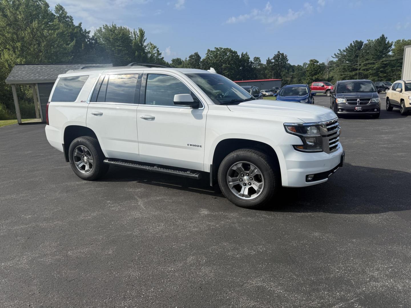 2016 White /Black Chevrolet Tahoe LT 4WD (1GNSKBKCXGR) with an 5.3L V8 OHV 16V engine, 6A transmission, located at 11115 Chardon Rd. , Chardon, OH, 44024, (440) 214-9705, 41.580246, -81.241943 - This 2016 Chevrolet Tahoe LT Z71 4WD is a well-equipped full-size SUV featuring a 5.3L EcoTec V8 engine paired with a 6-speed automatic transmission and 3.42 gearing, delivering an 8,200-pound towing capacity. It boasts a luxurious leather interior with heated and power front seats, heated second-ro - Photo#3