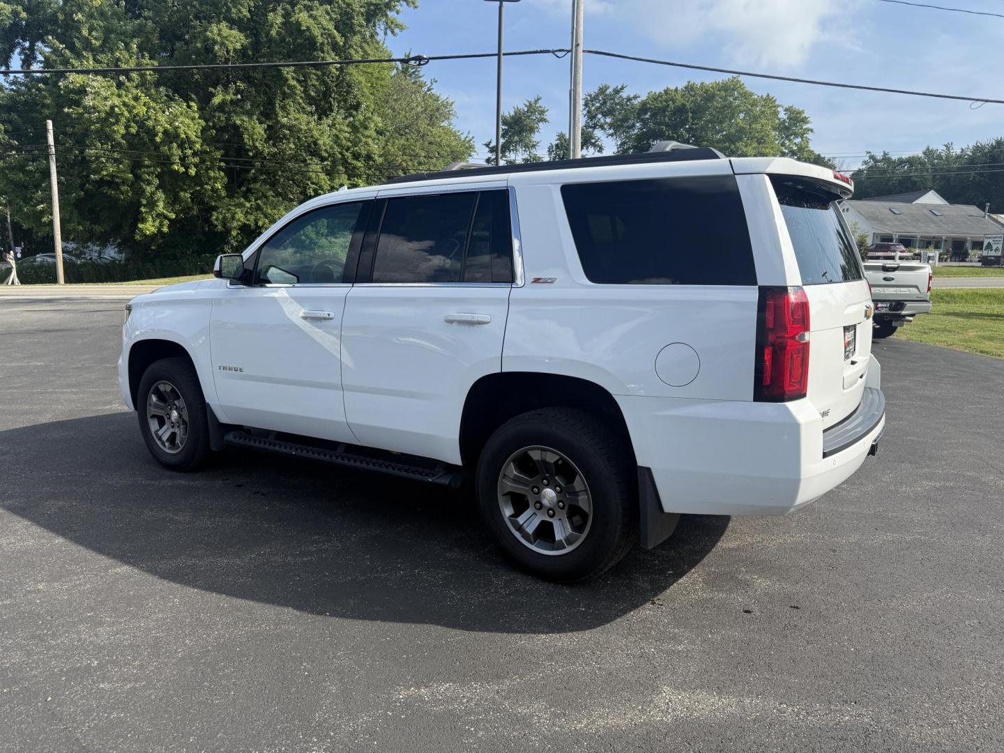 2016 White /Black Chevrolet Tahoe LT 4WD (1GNSKBKCXGR) with an 5.3L V8 OHV 16V engine, 6A transmission, located at 11115 Chardon Rd. , Chardon, OH, 44024, (440) 214-9705, 41.580246, -81.241943 - This 2016 Chevrolet Tahoe LT Z71 4WD is a well-equipped full-size SUV featuring a 5.3L EcoTec V8 engine paired with a 6-speed automatic transmission and 3.42 gearing, delivering an 8,200-pound towing capacity. It boasts a luxurious leather interior with heated and power front seats, heated second-ro - Photo#12