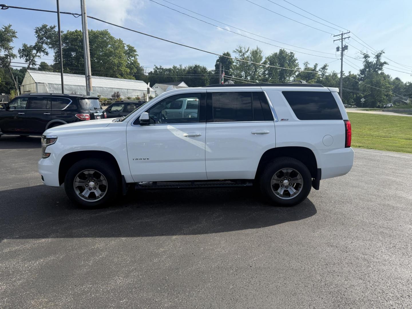 2016 White /Black Chevrolet Tahoe LT 4WD (1GNSKBKCXGR) with an 5.3L V8 OHV 16V engine, 6A transmission, located at 11115 Chardon Rd. , Chardon, OH, 44024, (440) 214-9705, 41.580246, -81.241943 - This 2016 Chevrolet Tahoe LT Z71 4WD is a well-equipped full-size SUV featuring a 5.3L EcoTec V8 engine paired with a 6-speed automatic transmission and 3.42 gearing, delivering an 8,200-pound towing capacity. It boasts a luxurious leather interior with heated and power front seats, heated second-ro - Photo#14