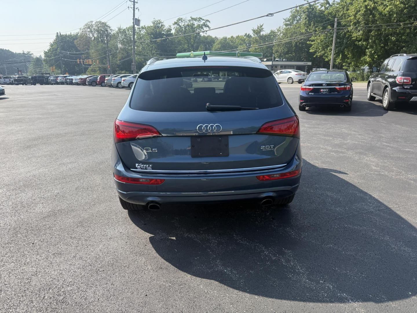 2017 Blue /Gray Audi Q5 2.0T Premium quattro (WA1C2AFP5HA) with an 2.0L I4 DOHC 16V Turbo engine, 8A transmission, located at 11115 Chardon Rd. , Chardon, OH, 44024, (440) 214-9705, 41.580246, -81.241943 - This 2017 Audi Q5 Premium features a 2.0L turbocharged I4 engine paired with an 8-speed automatic transmission and Audi’s renowned Quattro all-wheel drive, offering a blend of performance and efficiency with up to 27 MPG highway. Inside, it offers a refined leather interior, heated and power-adjus - Photo#8
