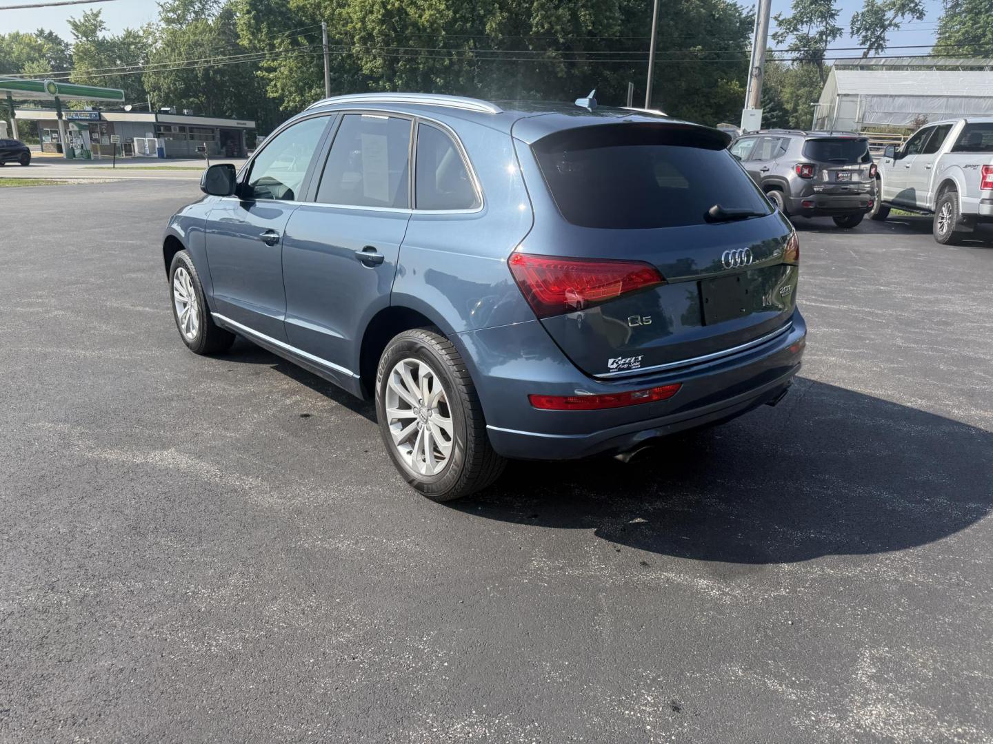 2017 Blue /Gray Audi Q5 2.0T Premium quattro (WA1C2AFP5HA) with an 2.0L I4 DOHC 16V Turbo engine, 8A transmission, located at 11115 Chardon Rd. , Chardon, OH, 44024, (440) 214-9705, 41.580246, -81.241943 - This 2017 Audi Q5 Premium features a 2.0L turbocharged I4 engine paired with an 8-speed automatic transmission and Audi’s renowned Quattro all-wheel drive, offering a blend of performance and efficiency with up to 27 MPG highway. Inside, it offers a refined leather interior, heated and power-adjus - Photo#9