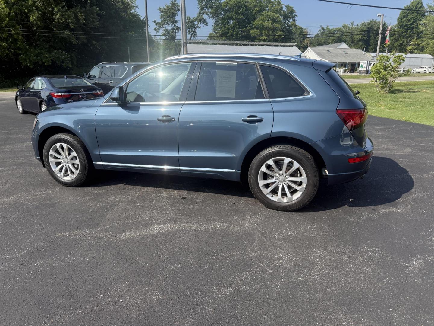 2017 Blue /Gray Audi Q5 2.0T Premium quattro (WA1C2AFP5HA) with an 2.0L I4 DOHC 16V Turbo engine, 8A transmission, located at 11115 Chardon Rd. , Chardon, OH, 44024, (440) 214-9705, 41.580246, -81.241943 - This 2017 Audi Q5 Premium features a 2.0L turbocharged I4 engine paired with an 8-speed automatic transmission and Audi’s renowned Quattro all-wheel drive, offering a blend of performance and efficiency with up to 27 MPG highway. Inside, it offers a refined leather interior, heated and power-adjus - Photo#10