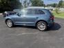 2017 Blue /Gray Audi Q5 2.0T Premium quattro (WA1C2AFP5HA) with an 2.0L I4 DOHC 16V Turbo engine, 8A transmission, located at 11115 Chardon Rd. , Chardon, OH, 44024, (440) 214-9705, 41.580246, -81.241943 - This 2017 Audi Q5 Premium features a 2.0L turbocharged I4 engine paired with an 8-speed automatic transmission and Audi’s renowned Quattro all-wheel drive, offering a blend of performance and efficiency with up to 27 MPG highway. Inside, it offers a refined leather interior, heated and power-adjus - Photo#10