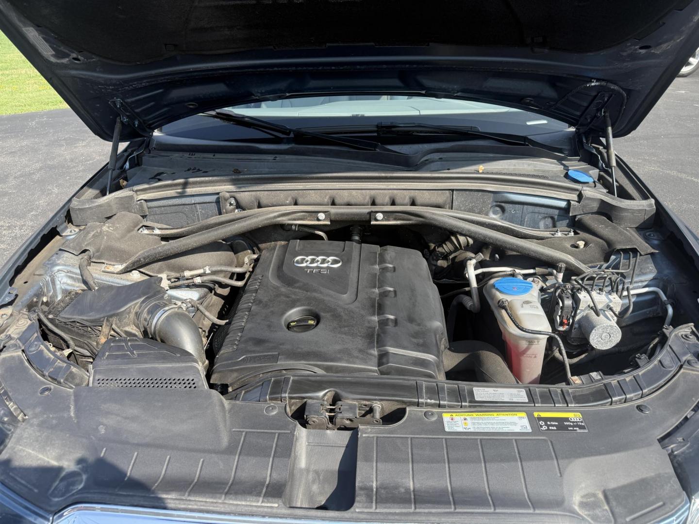 2017 Blue /Gray Audi Q5 2.0T Premium quattro (WA1C2AFP5HA) with an 2.0L I4 DOHC 16V Turbo engine, 8A transmission, located at 11115 Chardon Rd. , Chardon, OH, 44024, (440) 214-9705, 41.580246, -81.241943 - This 2017 Audi Q5 Premium features a 2.0L turbocharged I4 engine paired with an 8-speed automatic transmission and Audi’s renowned Quattro all-wheel drive, offering a blend of performance and efficiency with up to 27 MPG highway. Inside, it offers a refined leather interior, heated and power-adjus - Photo#14