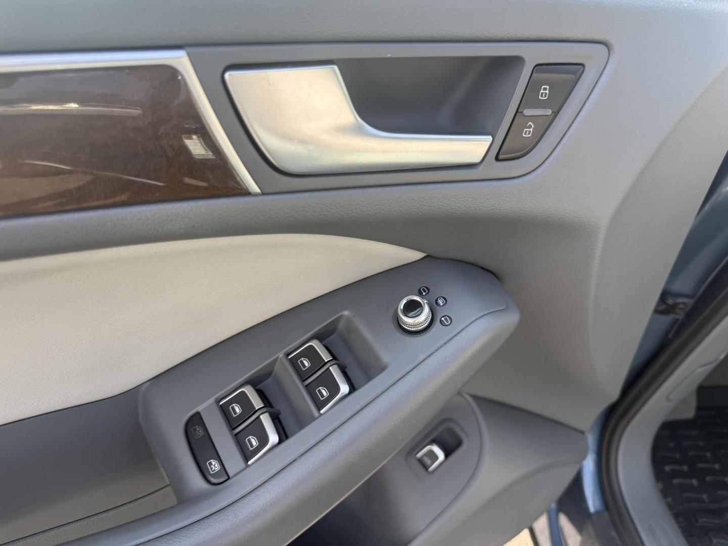 2017 Blue /Gray Audi Q5 2.0T Premium quattro (WA1C2AFP5HA) with an 2.0L I4 DOHC 16V Turbo engine, 8A transmission, located at 11115 Chardon Rd. , Chardon, OH, 44024, (440) 214-9705, 41.580246, -81.241943 - This 2017 Audi Q5 Premium features a 2.0L turbocharged I4 engine paired with an 8-speed automatic transmission and Audi’s renowned Quattro all-wheel drive, offering a blend of performance and efficiency with up to 27 MPG highway. Inside, it offers a refined leather interior, heated and power-adjus - Photo#17