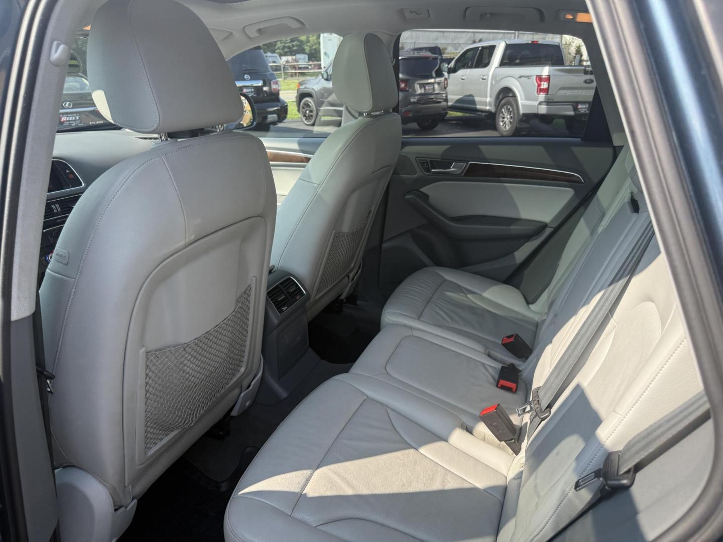 2017 Blue /Gray Audi Q5 2.0T Premium quattro (WA1C2AFP5HA) with an 2.0L I4 DOHC 16V Turbo engine, 8A transmission, located at 11115 Chardon Rd. , Chardon, OH, 44024, (440) 214-9705, 41.580246, -81.241943 - This 2017 Audi Q5 Premium features a 2.0L turbocharged I4 engine paired with an 8-speed automatic transmission and Audi’s renowned Quattro all-wheel drive, offering a blend of performance and efficiency with up to 27 MPG highway. Inside, it offers a refined leather interior, heated and power-adjus - Photo#31