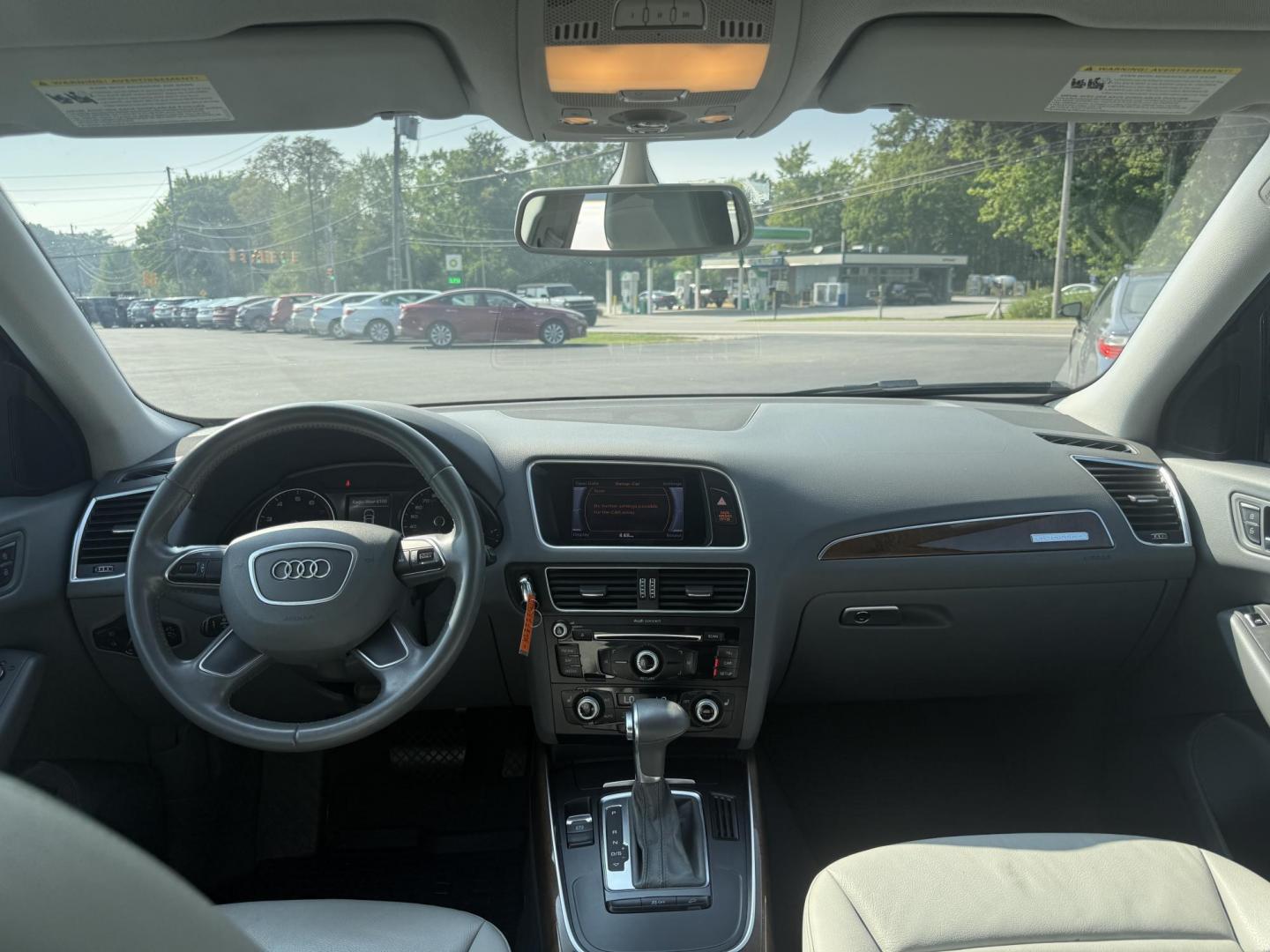 2017 Blue /Gray Audi Q5 2.0T Premium quattro (WA1C2AFP5HA) with an 2.0L I4 DOHC 16V Turbo engine, 8A transmission, located at 11115 Chardon Rd. , Chardon, OH, 44024, (440) 214-9705, 41.580246, -81.241943 - This 2017 Audi Q5 Premium features a 2.0L turbocharged I4 engine paired with an 8-speed automatic transmission and Audi’s renowned Quattro all-wheel drive, offering a blend of performance and efficiency with up to 27 MPG highway. Inside, it offers a refined leather interior, heated and power-adjus - Photo#34