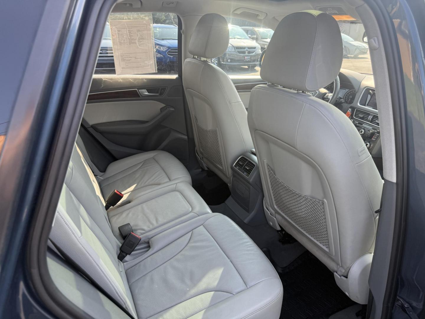 2017 Blue /Gray Audi Q5 2.0T Premium quattro (WA1C2AFP5HA) with an 2.0L I4 DOHC 16V Turbo engine, 8A transmission, located at 11115 Chardon Rd. , Chardon, OH, 44024, (440) 214-9705, 41.580246, -81.241943 - This 2017 Audi Q5 Premium features a 2.0L turbocharged I4 engine paired with an 8-speed automatic transmission and Audi’s renowned Quattro all-wheel drive, offering a blend of performance and efficiency with up to 27 MPG highway. Inside, it offers a refined leather interior, heated and power-adjus - Photo#38