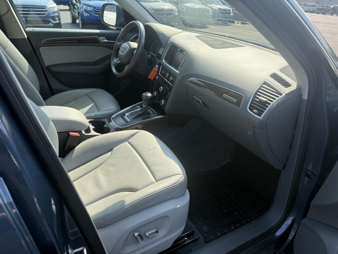 2017 Blue /Gray Audi Q5 2.0T Premium quattro (WA1C2AFP5HA) with an 2.0L I4 DOHC 16V Turbo engine, 8A transmission, located at 11115 Chardon Rd. , Chardon, OH, 44024, (440) 214-9705, 41.580246, -81.241943 - This 2017 Audi Q5 Premium features a 2.0L turbocharged I4 engine paired with an 8-speed automatic transmission and Audi’s renowned Quattro all-wheel drive, offering a blend of performance and efficiency with up to 27 MPG highway. Inside, it offers a refined leather interior, heated and power-adjus - Photo#40