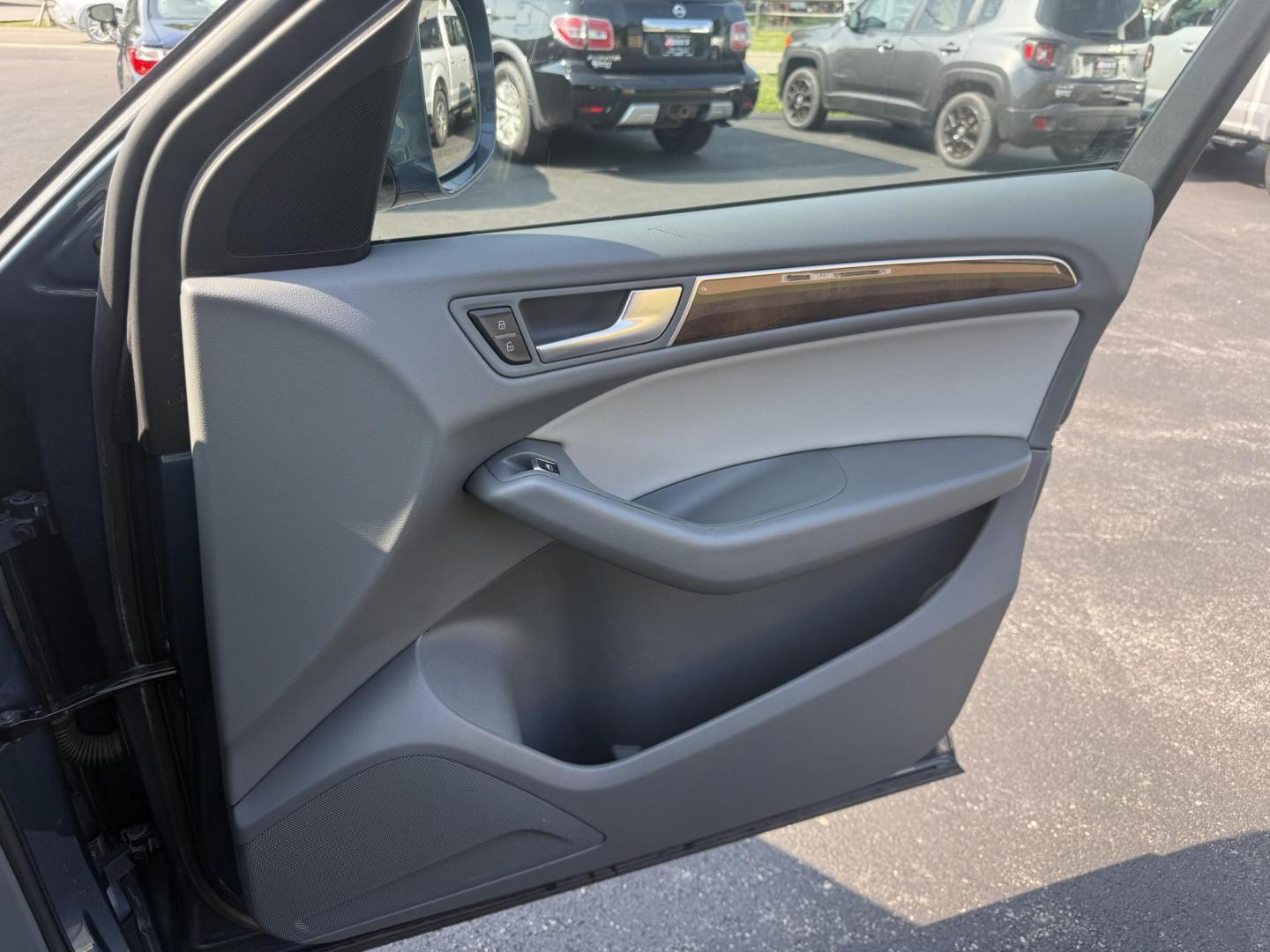 2017 Blue /Gray Audi Q5 2.0T Premium quattro (WA1C2AFP5HA) with an 2.0L I4 DOHC 16V Turbo engine, 8A transmission, located at 11115 Chardon Rd. , Chardon, OH, 44024, (440) 214-9705, 41.580246, -81.241943 - This 2017 Audi Q5 Premium features a 2.0L turbocharged I4 engine paired with an 8-speed automatic transmission and Audi’s renowned Quattro all-wheel drive, offering a blend of performance and efficiency with up to 27 MPG highway. Inside, it offers a refined leather interior, heated and power-adjus - Photo#44
