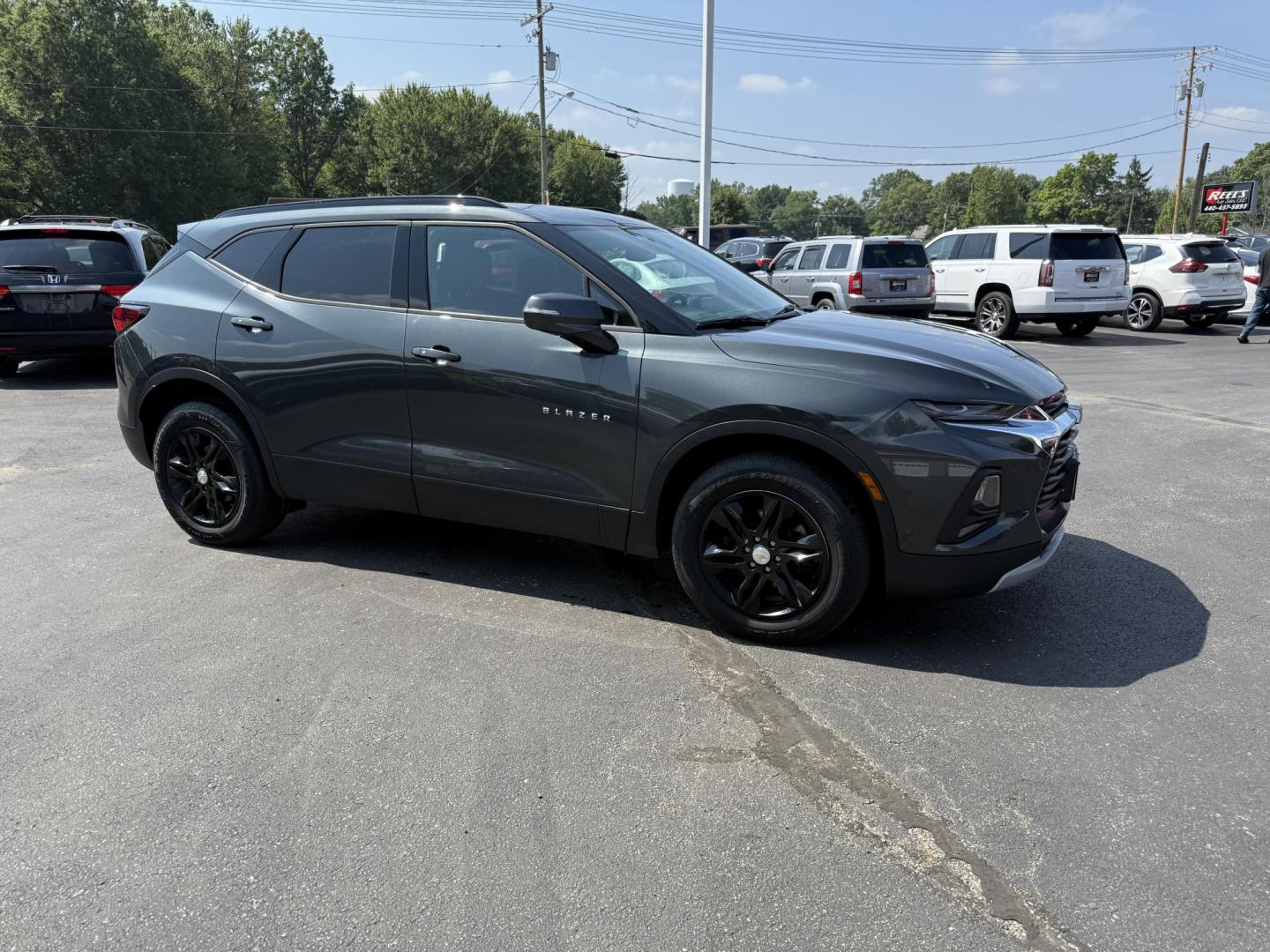 2020 Gray /Black Chevrolet Blazer 2LT AWD (3GNKBHRS9LS) with an 3.6L V6 DOHC 24V engine, 9A transmission, located at 547 E. Main St., Orwell, OH, 44076, (440) 437-5893, 41.535435, -80.847855 - This 2020 Chevrolet Blazer 2LT AWD is a sporty midsize SUV powered by a 3.6L V6 engine and 9-speed automatic transmission, delivering a robust 0-60 mph time of 6.1 seconds and a 4,500-pound towing capacity. It features a power driver’s seat, heated front seats, dual-zone automatic climate control, - Photo#3