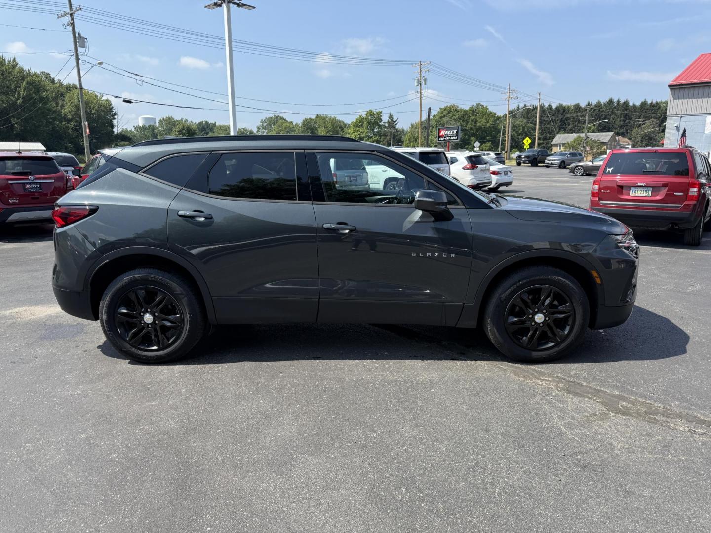 2020 Gray /Black Chevrolet Blazer 2LT AWD (3GNKBHRS9LS) with an 3.6L V6 DOHC 24V engine, 9A transmission, located at 547 E. Main St., Orwell, OH, 44076, (440) 437-5893, 41.535435, -80.847855 - This 2020 Chevrolet Blazer 2LT AWD is a sporty midsize SUV powered by a 3.6L V6 engine and 9-speed automatic transmission, delivering a robust 0-60 mph time of 6.1 seconds and a 4,500-pound towing capacity. It features a power driver’s seat, heated front seats, dual-zone automatic climate control, - Photo#5