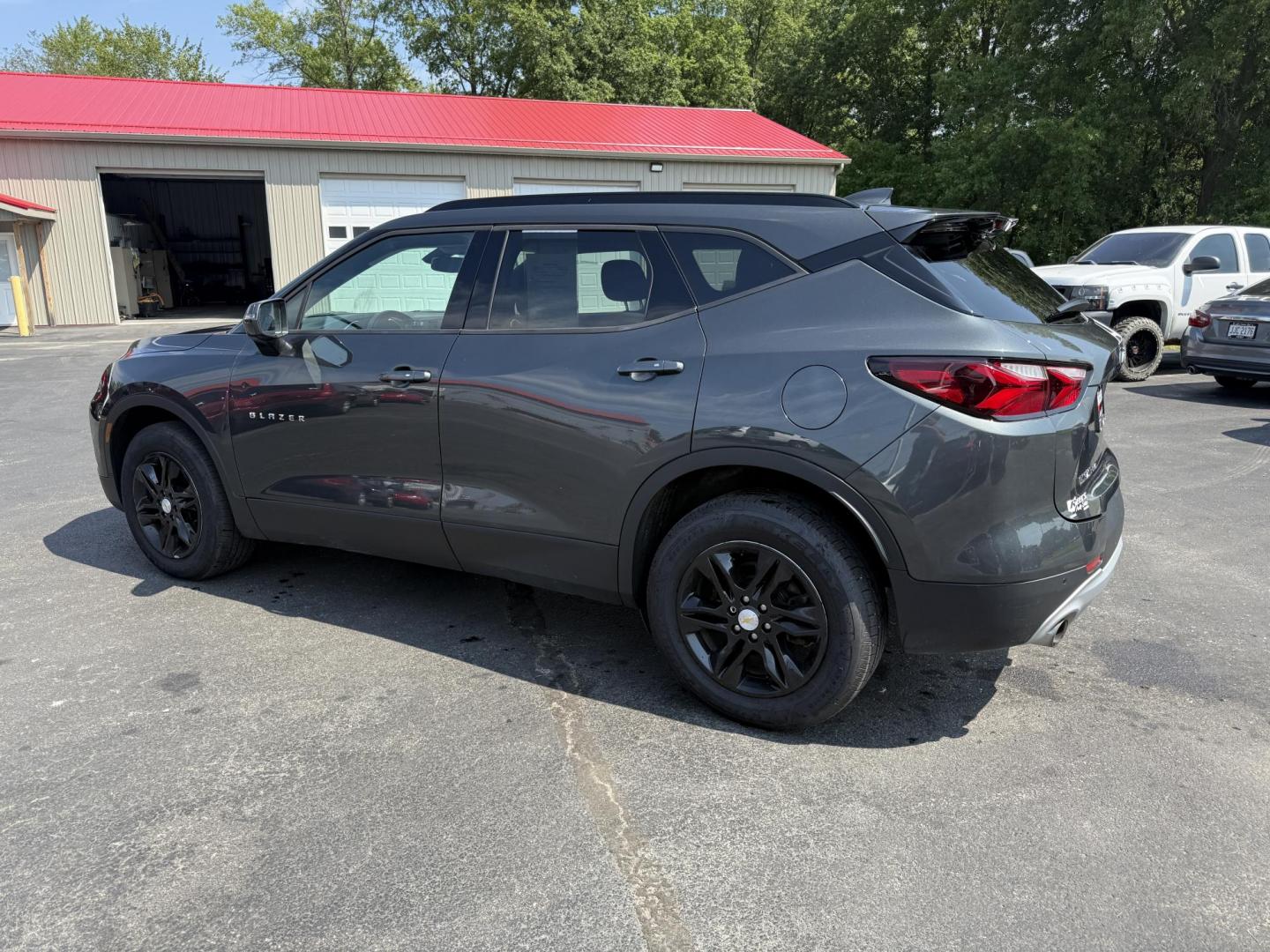 2020 Gray /Black Chevrolet Blazer 2LT AWD (3GNKBHRS9LS) with an 3.6L V6 DOHC 24V engine, 9A transmission, located at 547 E. Main St., Orwell, OH, 44076, (440) 437-5893, 41.535435, -80.847855 - This 2020 Chevrolet Blazer 2LT AWD is a sporty midsize SUV powered by a 3.6L V6 engine and 9-speed automatic transmission, delivering a robust 0-60 mph time of 6.1 seconds and a 4,500-pound towing capacity. It features a power driver’s seat, heated front seats, dual-zone automatic climate control, - Photo#11
