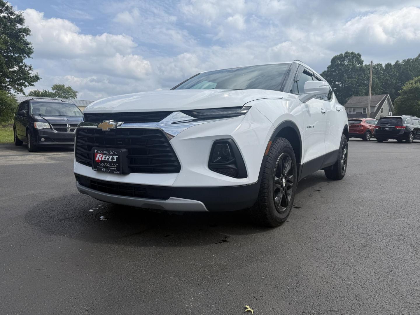 2021 White /Black Chevrolet Blazer 2LT AWD (3GNKBHRS1MS) with an 3.6L V6 DOHC 24V engine, 9A transmission, located at 547 E. Main St., Orwell, OH, 44076, (440) 437-5893, 41.535435, -80.847855 - This 2021 Chevrolet Blazer 2LT AWD is a sporty midsize SUV powered by a 3.6L V6 engine and 9-speed automatic transmission, delivering a robust 0-60 mph time of 6.1 seconds and a 4,500-pound towing capacity. It features a power driver’s seat, heated front seats, dual-zone automatic climate control, - Photo#0