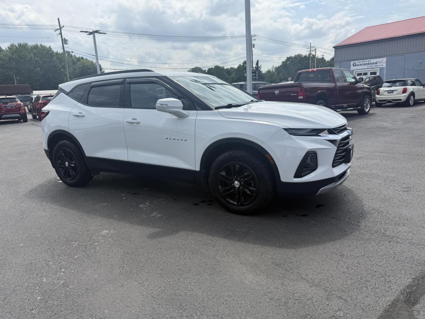 2021 White /Black Chevrolet Blazer 2LT AWD (3GNKBHRS1MS) with an 3.6L V6 DOHC 24V engine, 9A transmission, located at 547 E. Main St., Orwell, OH, 44076, (440) 437-5893, 41.535435, -80.847855 - This 2021 Chevrolet Blazer 2LT AWD is a sporty midsize SUV powered by a 3.6L V6 engine and 9-speed automatic transmission, delivering a robust 0-60 mph time of 6.1 seconds and a 4,500-pound towing capacity. It features a power driver’s seat, heated front seats, dual-zone automatic climate control, - Photo#3