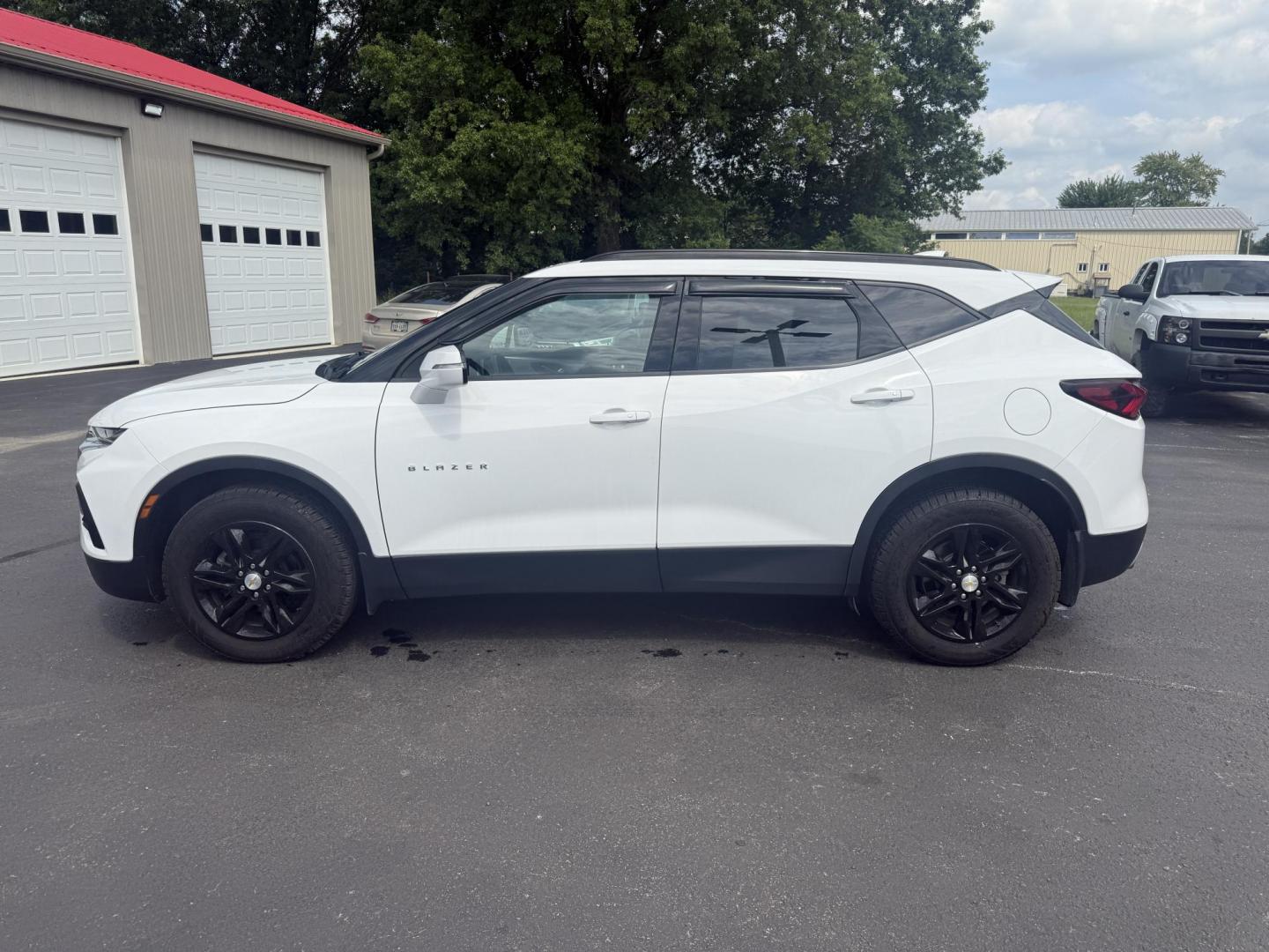 2021 White /Black Chevrolet Blazer 2LT AWD (3GNKBHRS1MS) with an 3.6L V6 DOHC 24V engine, 9A transmission, located at 547 E. Main St., Orwell, OH, 44076, (440) 437-5893, 41.535435, -80.847855 - This 2021 Chevrolet Blazer 2LT AWD is a sporty midsize SUV powered by a 3.6L V6 engine and 9-speed automatic transmission, delivering a robust 0-60 mph time of 6.1 seconds and a 4,500-pound towing capacity. It features a power driver’s seat, heated front seats, dual-zone automatic climate control, - Photo#13