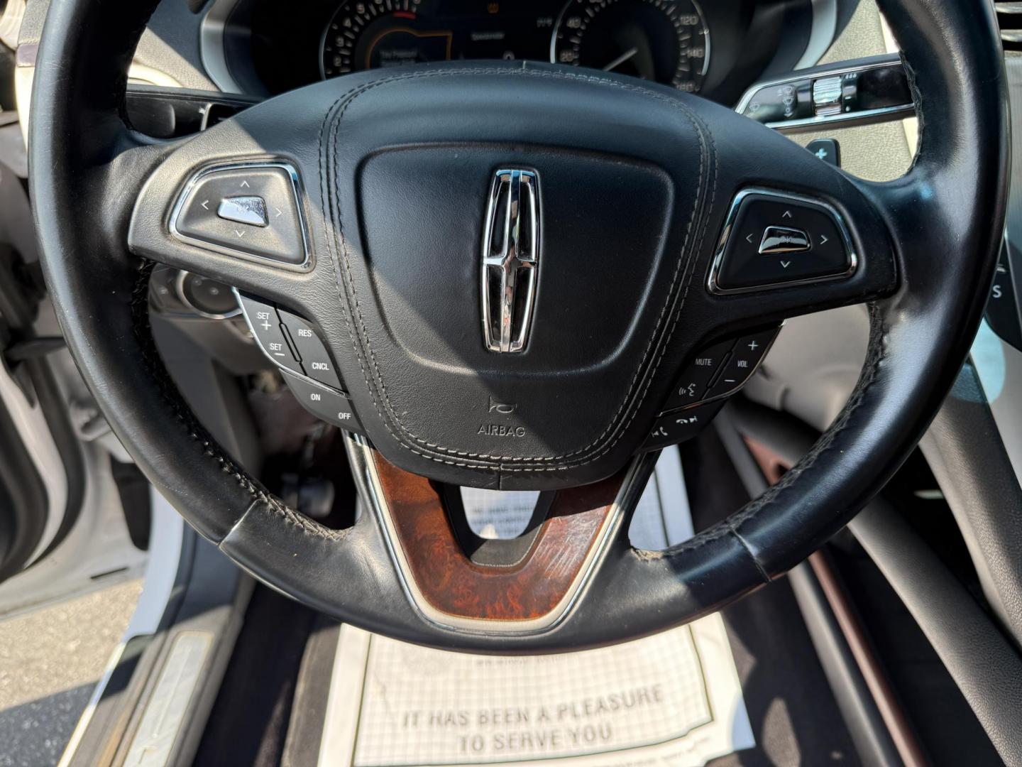2017 White /Brown Lincoln MKZ Reserve AWD (3LN6L5FC1HR) with an 3.0 V6 TWIN TURBO engine, 6A transmission, located at 11115 Chardon Rd. , Chardon, OH, 44024, (440) 214-9705, 41.580246, -81.241943 - This 2017 Lincoln MKZ Reserve AWD with the 3.0L twin-turbo EcoBoost V6 engine delivers a luxurious and performance-oriented driving experience, producing 400 horsepower and accelerating from 0-60 mph in about 4.8 seconds. It features a refined leather interior with heated and cooled front seats, an - Photo#24