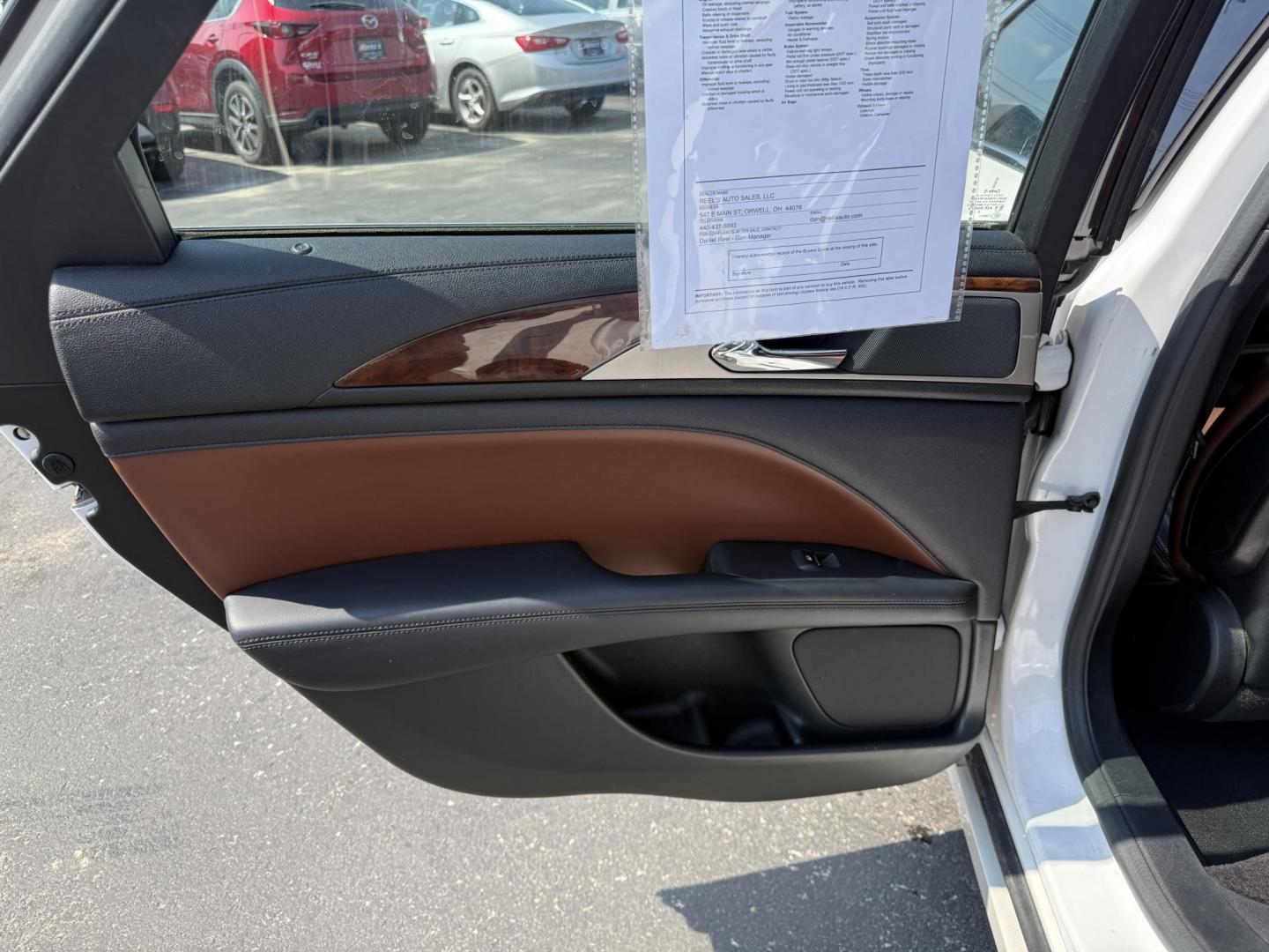 2017 White /Brown Lincoln MKZ Reserve AWD (3LN6L5FC1HR) with an 3.0 V6 TWIN TURBO engine, 6A transmission, located at 11115 Chardon Rd. , Chardon, OH, 44024, (440) 214-9705, 41.580246, -81.241943 - This 2017 Lincoln MKZ Reserve AWD with the 3.0L twin-turbo EcoBoost V6 engine delivers a luxurious and performance-oriented driving experience, producing 400 horsepower and accelerating from 0-60 mph in about 4.8 seconds. It features a refined leather interior with heated and cooled front seats, an - Photo#35