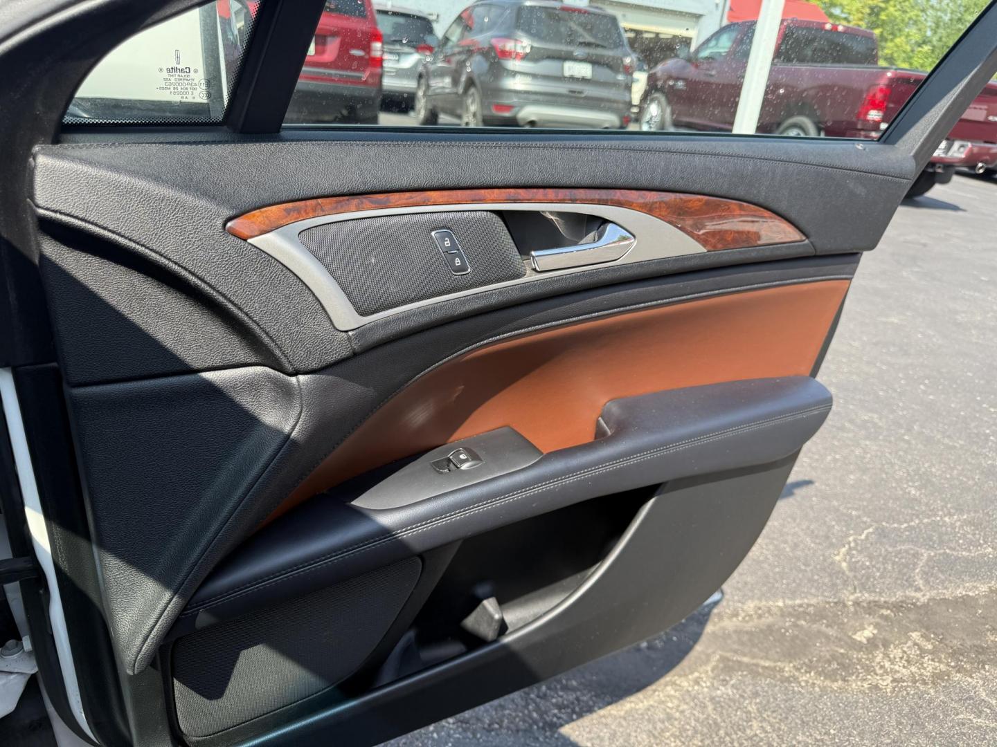 2017 White /Brown Lincoln MKZ Reserve AWD (3LN6L5FC1HR) with an 3.0 V6 TWIN TURBO engine, 6A transmission, located at 11115 Chardon Rd. , Chardon, OH, 44024, (440) 214-9705, 41.580246, -81.241943 - This 2017 Lincoln MKZ Reserve AWD with the 3.0L twin-turbo EcoBoost V6 engine delivers a luxurious and performance-oriented driving experience, producing 400 horsepower and accelerating from 0-60 mph in about 4.8 seconds. It features a refined leather interior with heated and cooled front seats, an - Photo#47
