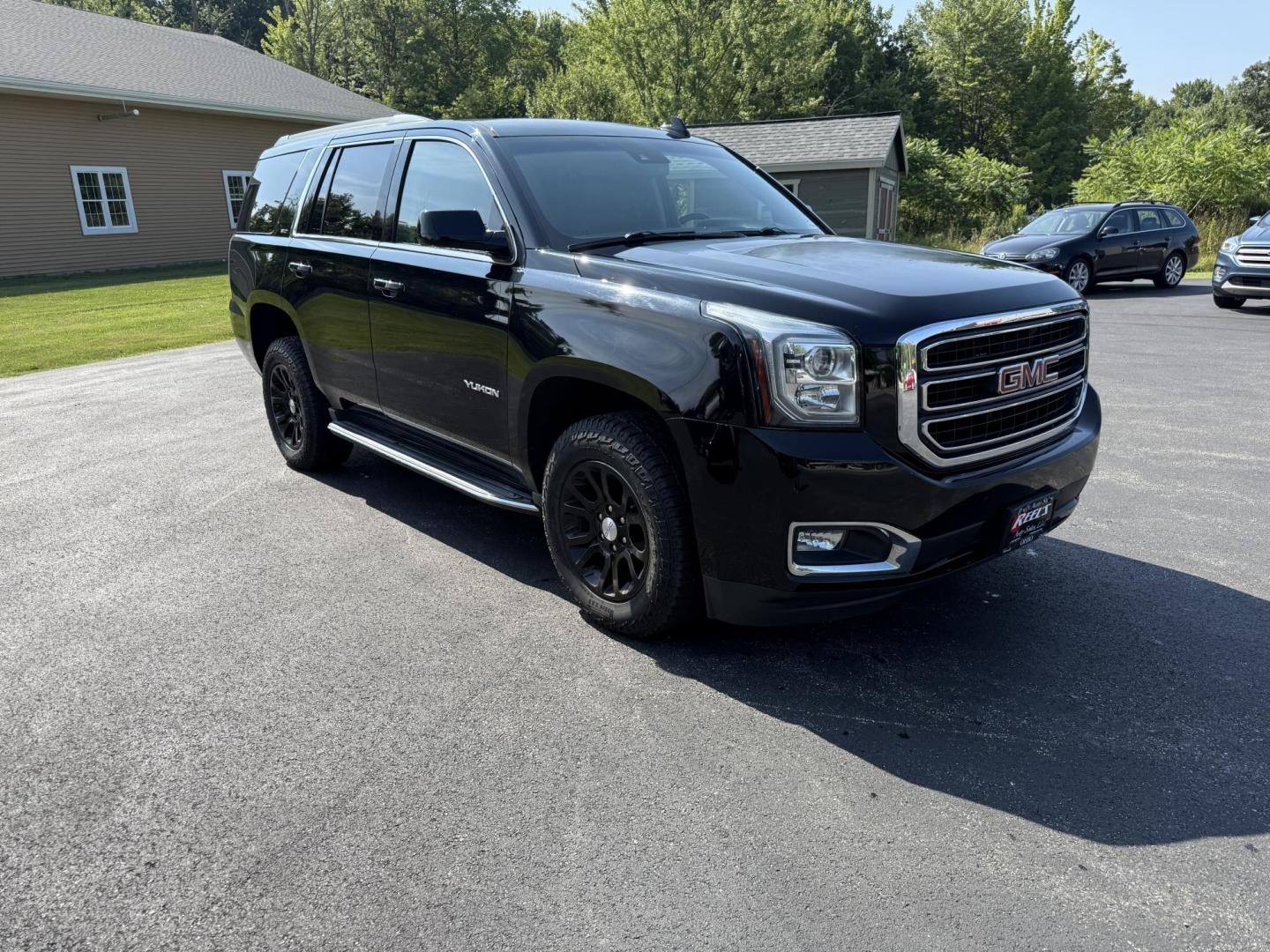2017 Black /Black GMC Yukon SLT 4WD (1GKS2BKC9HR) with an 5.3L V8 OHV 16V FFV engine, 6A transmission, located at 11115 Chardon Rd. , Chardon, OH, 44024, (440) 214-9705, 41.580246, -81.241943 - This 2017 GMC Yukon SLT 4WD is a full-size SUV powered by a 5.3L EcoTec3 V8 engine and 6-speed automatic transmission with 3.08 gearing, offering a 6,200-pound towing capacity and FlexFuel capability. It features a luxurious leather interior with heated and cooled power front seats, heated second-r - Photo#2