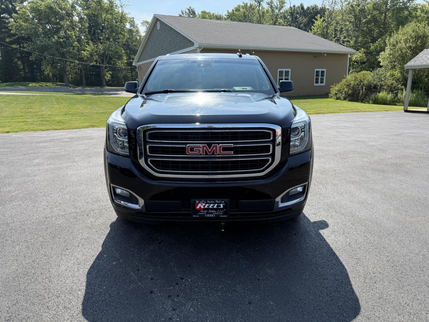 2017 Black /Black GMC Yukon SLT 4WD (1GKS2BKC9HR) with an 5.3L V8 OHV 16V FFV engine, 6A transmission, located at 11115 Chardon Rd. , Chardon, OH, 44024, (440) 214-9705, 41.580246, -81.241943 - This 2017 GMC Yukon SLT 4WD is a full-size SUV powered by a 5.3L EcoTec3 V8 engine and 6-speed automatic transmission with 3.08 gearing, offering a 6,200-pound towing capacity and FlexFuel capability. It features a luxurious leather interior with heated and cooled power front seats, heated second-r - Photo#1