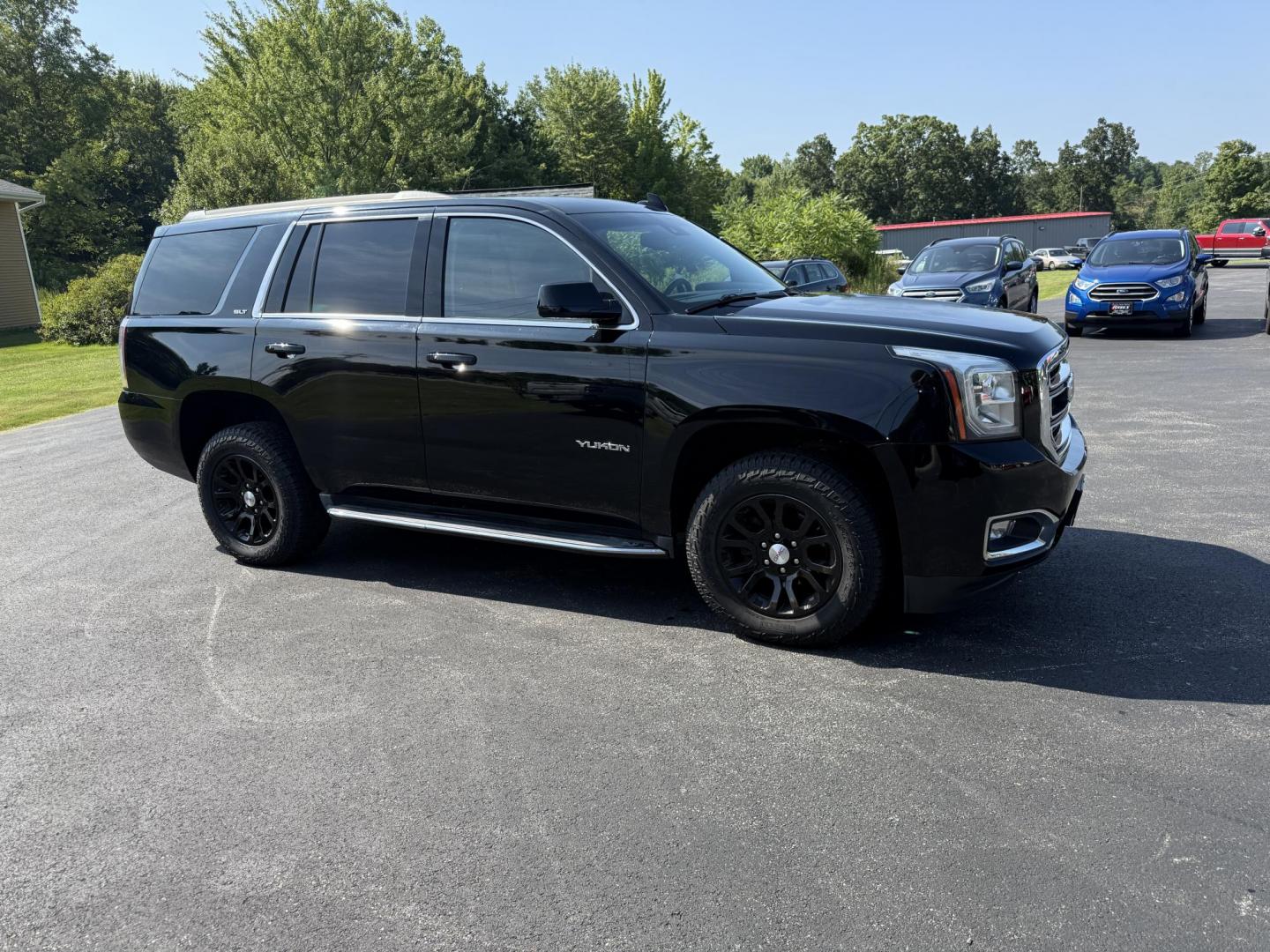 2017 Black /Black GMC Yukon SLT 4WD (1GKS2BKC9HR) with an 5.3L V8 OHV 16V FFV engine, 6A transmission, located at 11115 Chardon Rd. , Chardon, OH, 44024, (440) 214-9705, 41.580246, -81.241943 - This 2017 GMC Yukon SLT 4WD is a full-size SUV powered by a 5.3L EcoTec3 V8 engine and 6-speed automatic transmission with 3.08 gearing, offering a 6,200-pound towing capacity and FlexFuel capability. It features a luxurious leather interior with heated and cooled power front seats, heated second-r - Photo#3