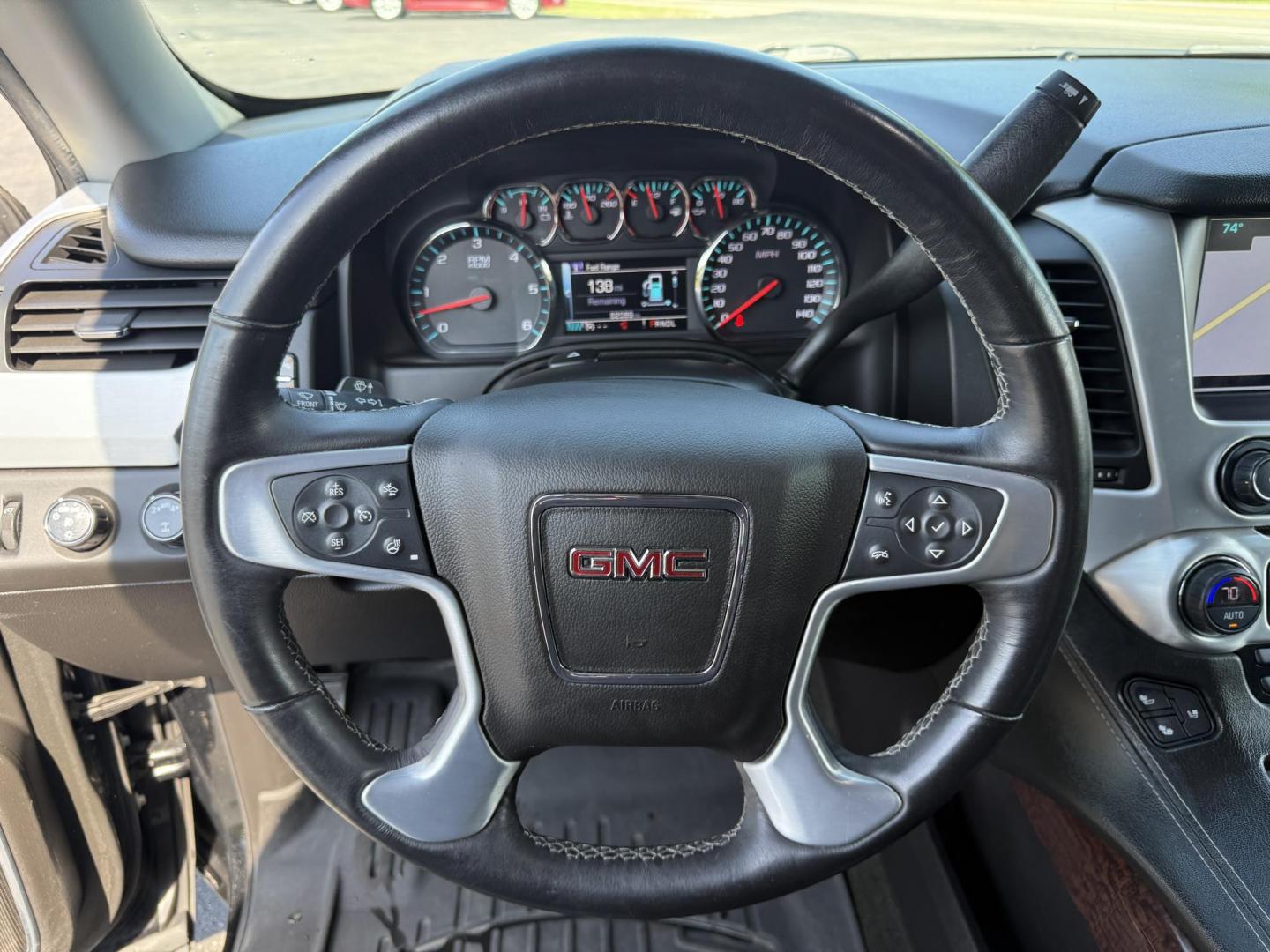2017 Black /Black GMC Yukon SLT 4WD (1GKS2BKC9HR) with an 5.3L V8 OHV 16V FFV engine, 6A transmission, located at 11115 Chardon Rd. , Chardon, OH, 44024, (440) 214-9705, 41.580246, -81.241943 - This 2017 GMC Yukon SLT 4WD is a full-size SUV powered by a 5.3L EcoTec3 V8 engine and 6-speed automatic transmission with 3.08 gearing, offering a 6,200-pound towing capacity and FlexFuel capability. It features a luxurious leather interior with heated and cooled power front seats, heated second-r - Photo#27