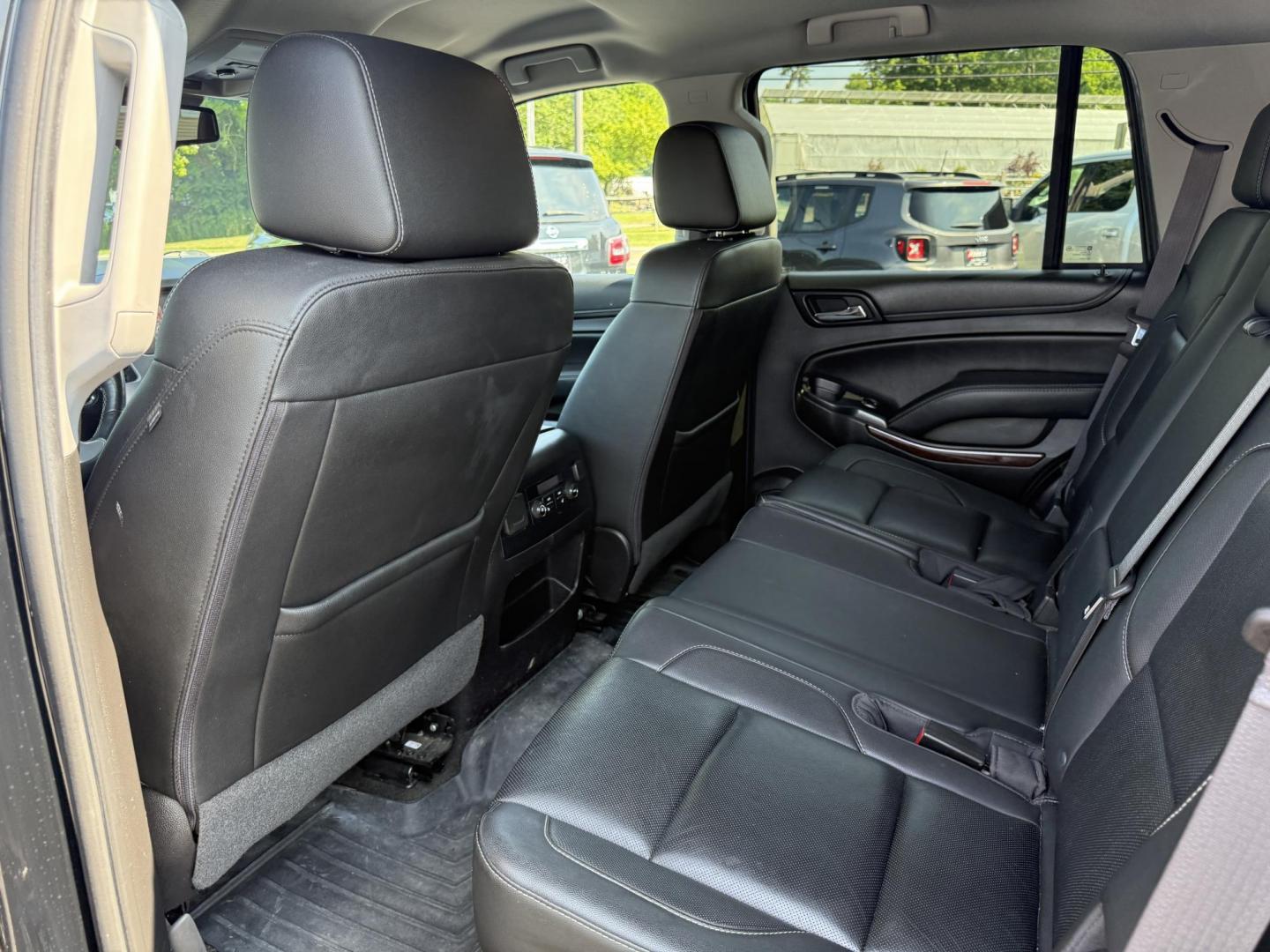 2017 Black /Black GMC Yukon SLT 4WD (1GKS2BKC9HR) with an 5.3L V8 OHV 16V FFV engine, 6A transmission, located at 11115 Chardon Rd. , Chardon, OH, 44024, (440) 214-9705, 41.580246, -81.241943 - This 2017 GMC Yukon SLT 4WD is a full-size SUV powered by a 5.3L EcoTec3 V8 engine and 6-speed automatic transmission with 3.08 gearing, offering a 6,200-pound towing capacity and FlexFuel capability. It features a luxurious leather interior with heated and cooled power front seats, heated second-r - Photo#36