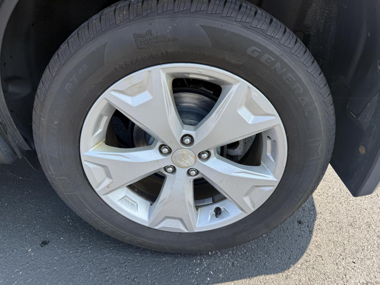 2015 Red /Gray Subaru Forester 2.5i (JF2SJABC5FH) with an 2.5L H4 DOHC 16V engine, Automatic transmission, located at 11115 Chardon Rd. , Chardon, OH, 44024, (440) 214-9705, 41.580246, -81.241943 - This One Owner 2015 Subaru Forester 2.5i features a 2.5-liter H4 (horizontally opposed 4-cylinder) engine paired with Subaru's signature Symmetrical All-Wheel Drive system, delivering reliable traction and stability in various driving conditions. It offers an impressive EPA-estimated 31 MPG on the h - Photo#11