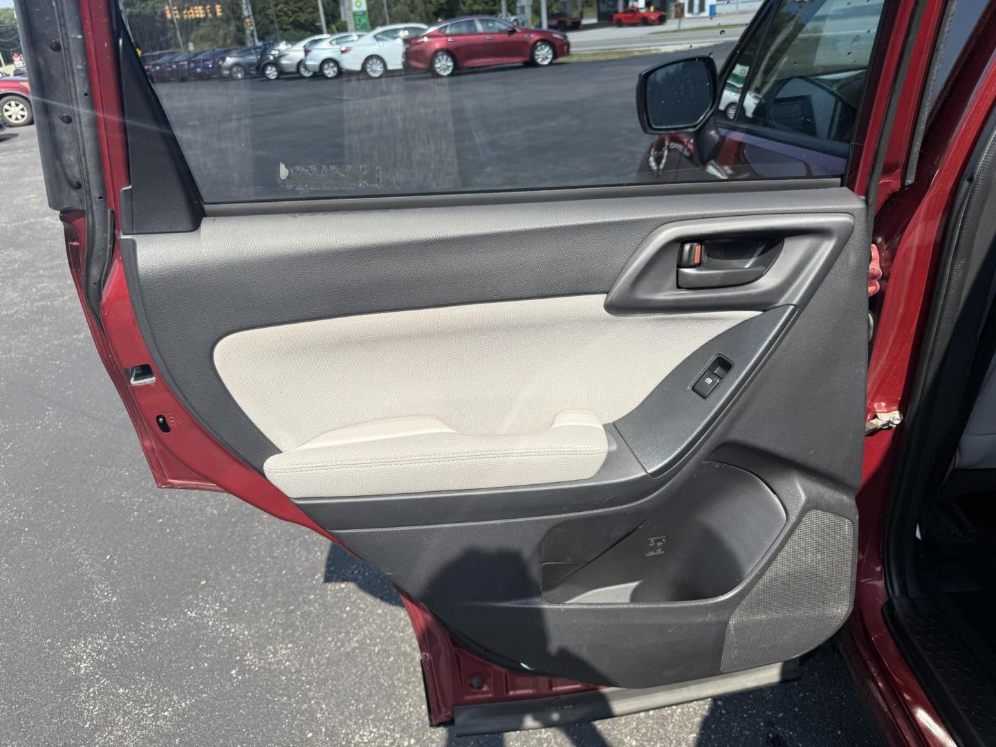 2015 Red /Gray Subaru Forester 2.5i (JF2SJABC5FH) with an 2.5L H4 DOHC 16V engine, Automatic transmission, located at 11115 Chardon Rd. , Chardon, OH, 44024, (440) 214-9705, 41.580246, -81.241943 - This One Owner 2015 Subaru Forester 2.5i features a 2.5-liter H4 (horizontally opposed 4-cylinder) engine paired with Subaru's signature Symmetrical All-Wheel Drive system, delivering reliable traction and stability in various driving conditions. It offers an impressive EPA-estimated 31 MPG on the h - Photo#30