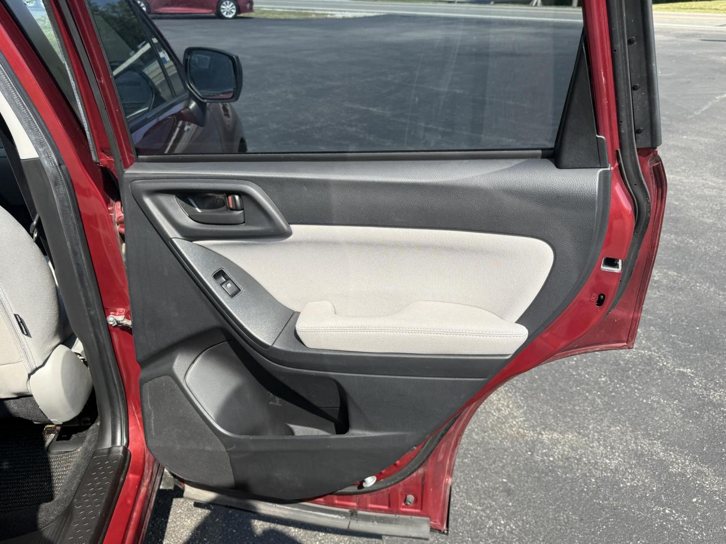2015 Red /Gray Subaru Forester 2.5i (JF2SJABC5FH) with an 2.5L H4 DOHC 16V engine, Automatic transmission, located at 11115 Chardon Rd. , Chardon, OH, 44024, (440) 214-9705, 41.580246, -81.241943 - This One Owner 2015 Subaru Forester 2.5i features a 2.5-liter H4 (horizontally opposed 4-cylinder) engine paired with Subaru's signature Symmetrical All-Wheel Drive system, delivering reliable traction and stability in various driving conditions. It offers an impressive EPA-estimated 31 MPG on the h - Photo#35