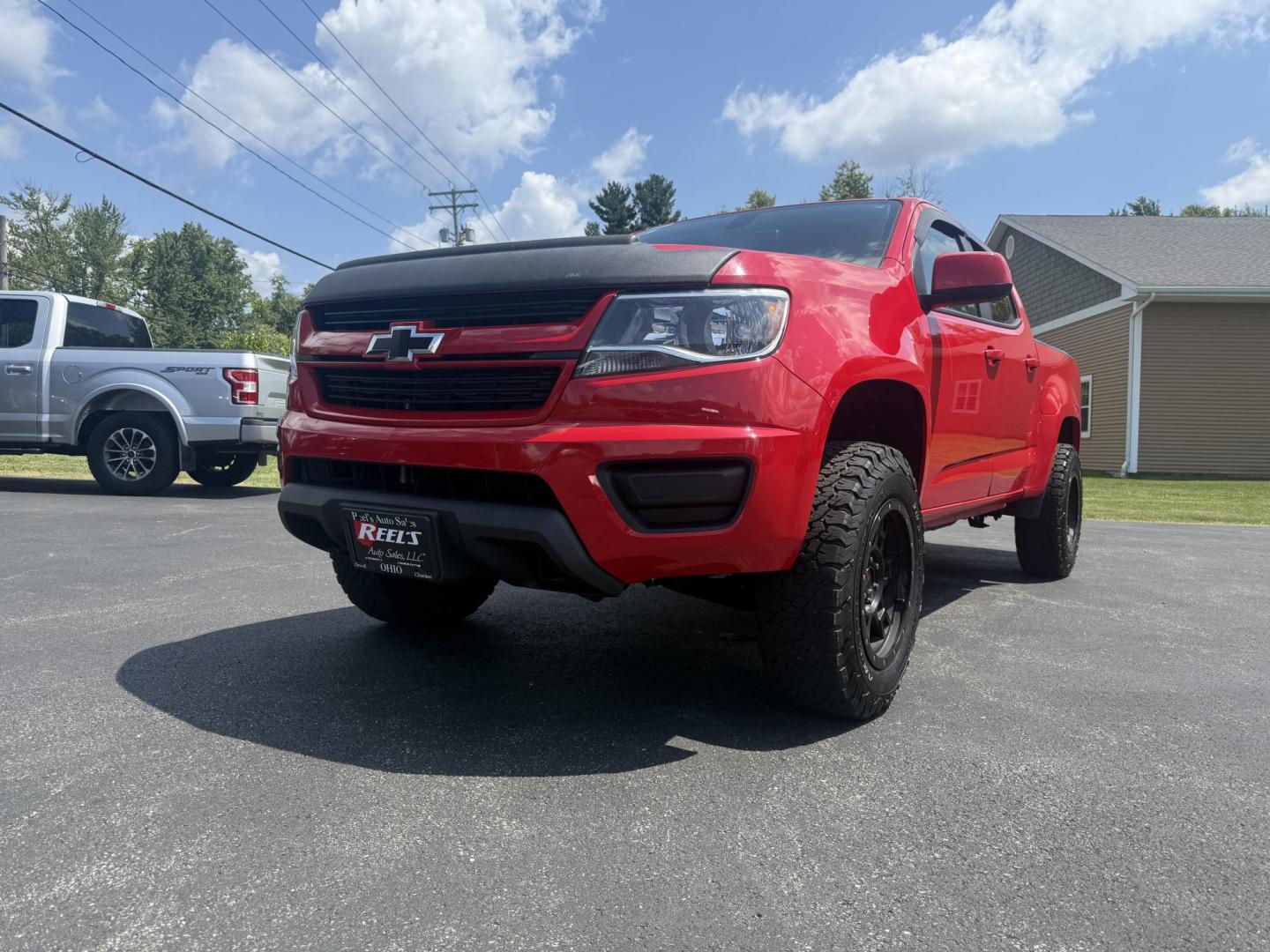 2020 Red /Gray Chevrolet Colorado Work Truck Crew Cab 4WD Short Box (1GCGTBEN3L1) with an 3.6L V6 DOHC 24V GAS engine, 8-Speed Automatic transmission, located at 11115 Chardon Rd. , Chardon, OH, 44024, (440) 214-9705, 41.580246, -81.241943 - This One Owner 2020 Chevrolet Colorado Work Truck Crew Cab 4WD with the 3.6L V6 engine and 8-speed automatic transmission offers strong performance and capability, especially with its 3.42 rear axle gearing for balanced power and efficiency. This model features a 7.0" touchscreen infotainment system - Photo#0