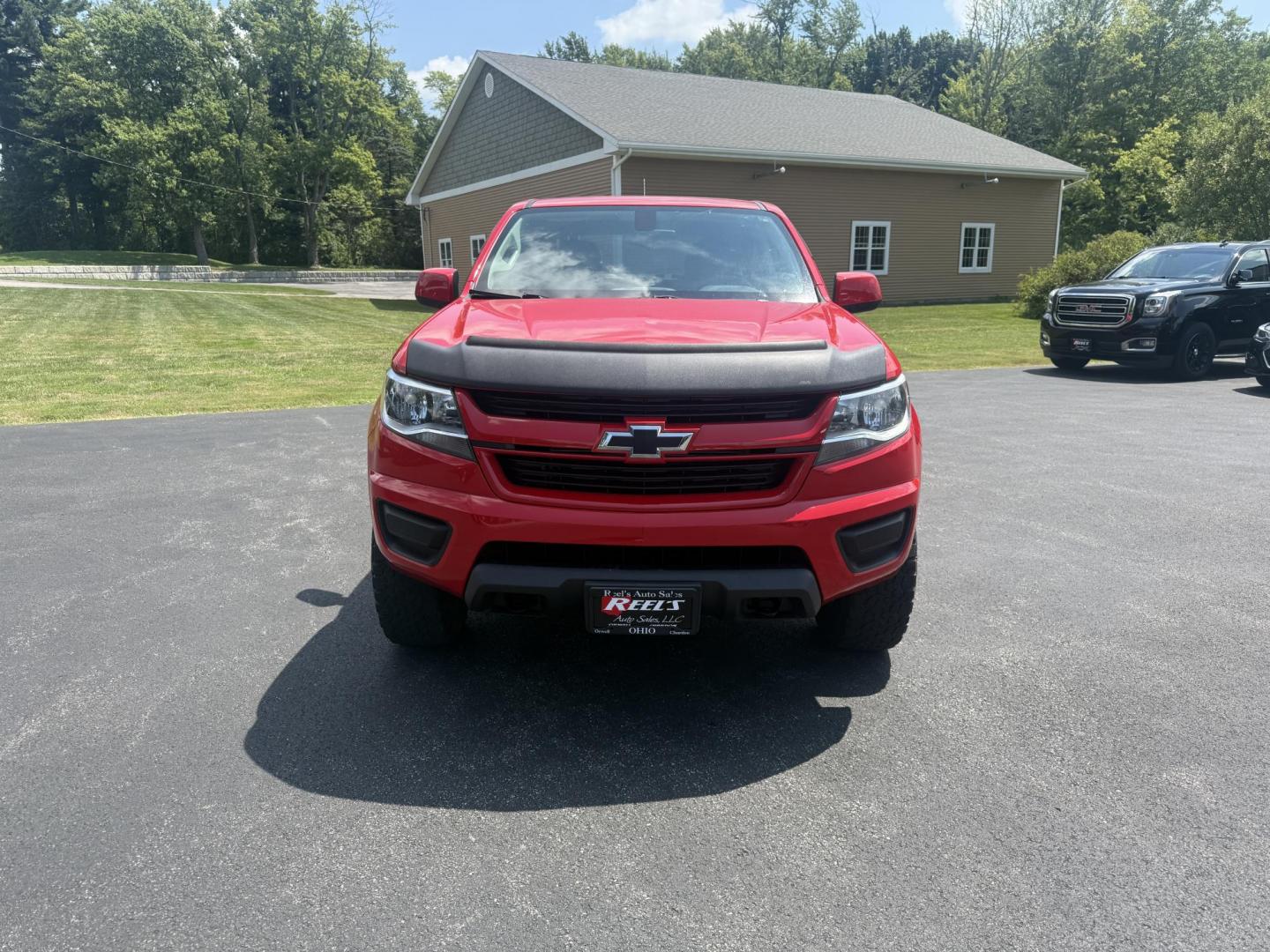 2020 Red /Gray Chevrolet Colorado Work Truck Crew Cab 4WD Short Box (1GCGTBEN3L1) with an 3.6L V6 DOHC 24V GAS engine, 8-Speed Automatic transmission, located at 11115 Chardon Rd. , Chardon, OH, 44024, (440) 214-9705, 41.580246, -81.241943 - This One Owner 2020 Chevrolet Colorado Work Truck Crew Cab 4WD with the 3.6L V6 engine and 8-speed automatic transmission offers strong performance and capability, especially with its 3.42 rear axle gearing for balanced power and efficiency. This model features a 7.0" touchscreen infotainment system - Photo#1