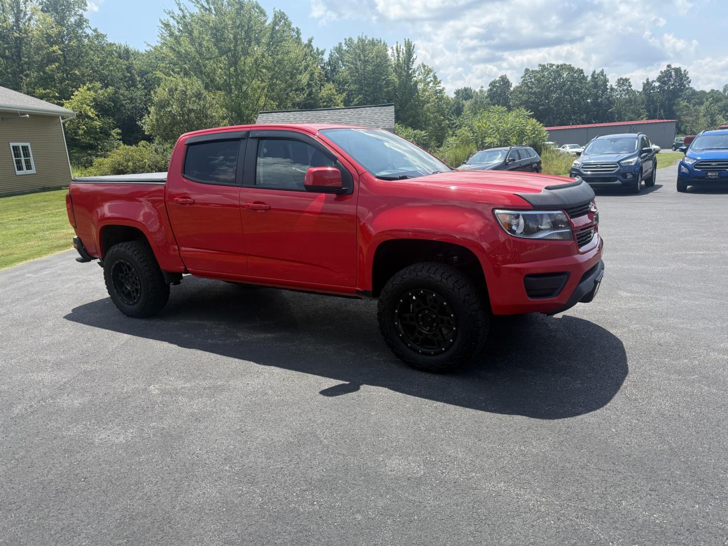 2020 Red /Gray Chevrolet Colorado Work Truck Crew Cab 4WD Short Box (1GCGTBEN3L1) with an 3.6L V6 DOHC 24V GAS engine, 8-Speed Automatic transmission, located at 11115 Chardon Rd. , Chardon, OH, 44024, (440) 214-9705, 41.580246, -81.241943 - This One Owner 2020 Chevrolet Colorado Work Truck Crew Cab 4WD with the 3.6L V6 engine and 8-speed automatic transmission offers strong performance and capability, especially with its 3.42 rear axle gearing for balanced power and efficiency. This model features a 7.0" touchscreen infotainment system - Photo#3