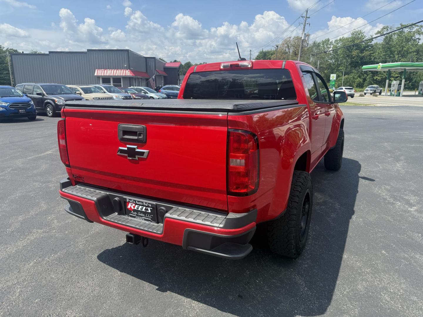 2020 Red /Gray Chevrolet Colorado Work Truck Crew Cab 4WD Short Box (1GCGTBEN3L1) with an 3.6L V6 DOHC 24V GAS engine, 8-Speed Automatic transmission, located at 11115 Chardon Rd. , Chardon, OH, 44024, (440) 214-9705, 41.580246, -81.241943 - This One Owner 2020 Chevrolet Colorado Work Truck Crew Cab 4WD with the 3.6L V6 engine and 8-speed automatic transmission offers strong performance and capability, especially with its 3.42 rear axle gearing for balanced power and efficiency. This model features a 7.0" touchscreen infotainment system - Photo#8