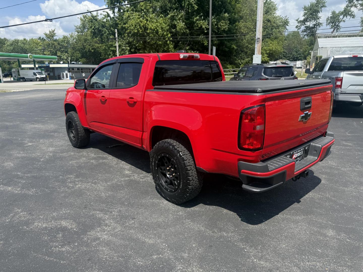 2020 Red /Gray Chevrolet Colorado Work Truck Crew Cab 4WD Short Box (1GCGTBEN3L1) with an 3.6L V6 DOHC 24V GAS engine, 8-Speed Automatic transmission, located at 11115 Chardon Rd. , Chardon, OH, 44024, (440) 214-9705, 41.580246, -81.241943 - This One Owner 2020 Chevrolet Colorado Work Truck Crew Cab 4WD with the 3.6L V6 engine and 8-speed automatic transmission offers strong performance and capability, especially with its 3.42 rear axle gearing for balanced power and efficiency. This model features a 7.0" touchscreen infotainment system - Photo#11