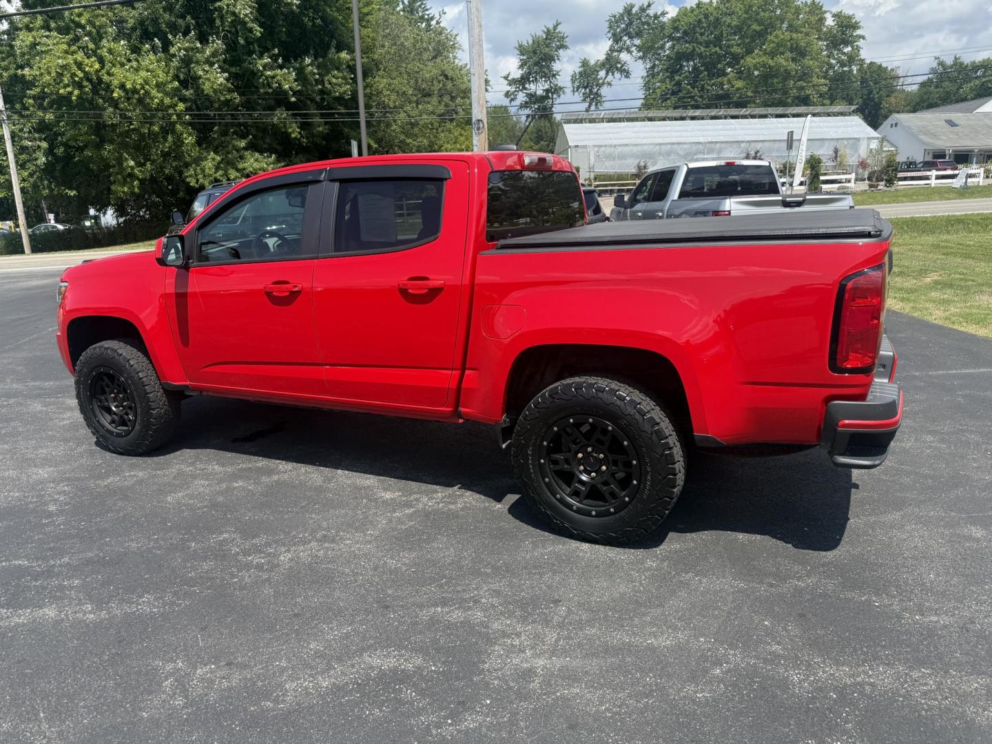 2020 Red /Gray Chevrolet Colorado Work Truck Crew Cab 4WD Short Box (1GCGTBEN3L1) with an 3.6L V6 DOHC 24V GAS engine, 8-Speed Automatic transmission, located at 11115 Chardon Rd. , Chardon, OH, 44024, (440) 214-9705, 41.580246, -81.241943 - This One Owner 2020 Chevrolet Colorado Work Truck Crew Cab 4WD with the 3.6L V6 engine and 8-speed automatic transmission offers strong performance and capability, especially with its 3.42 rear axle gearing for balanced power and efficiency. This model features a 7.0" touchscreen infotainment system - Photo#12