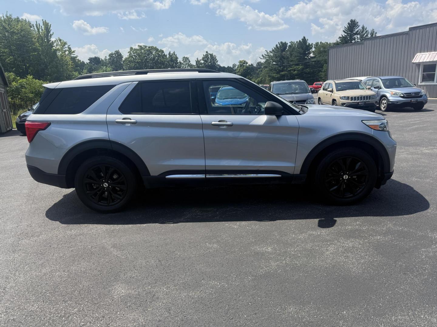 2020 Silver /Black Ford Explorer XLT AWD (1FMSK8DH4LG) with an 2.3L I4 DOHC 16V Turbo engine, 10A transmission, located at 11115 Chardon Rd. , Chardon, OH, 44024, (440) 214-9705, 41.580246, -81.241943 - This 2020 Ford Explorer XLT 4WD with the 2.3L turbocharged I4 EcoBoost engine and 10-speed automatic transmission offers a blend of performance and efficiency, achieving up to 27 MPG highway. It features a leather interior with power and heated front seats, heated second-row captain’s chairs, and - Photo#5