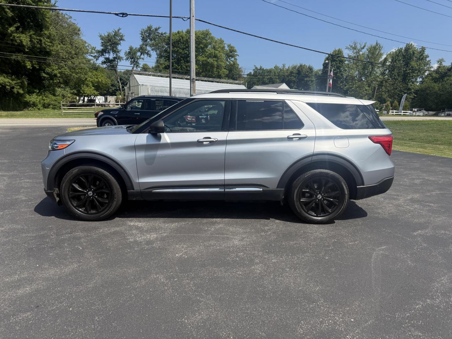 2020 Silver /Black Ford Explorer XLT AWD (1FMSK8DH4LG) with an 2.3L I4 DOHC 16V Turbo engine, 10A transmission, located at 11115 Chardon Rd. , Chardon, OH, 44024, (440) 214-9705, 41.580246, -81.241943 - This 2020 Ford Explorer XLT 4WD with the 2.3L turbocharged I4 EcoBoost engine and 10-speed automatic transmission offers a blend of performance and efficiency, achieving up to 27 MPG highway. It features a leather interior with power and heated front seats, heated second-row captain’s chairs, and - Photo#12
