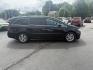 2014 Black /Gray Honda Odyssey EX-L (5FNRL5H6XEB) with an 3.5L V6 SOHC 24V engine, 6-Speed Automatic transmission, located at 547 E. Main St., Orwell, OH, 44076, (440) 437-5893, 41.535435, -80.847855 - This 2014 Honda Odyssey EX-L with Navigation is a well-equipped minivan featuring a 3.5L V6 engine and a 6-speed automatic transmission, delivering up to 27 MPG on the highway. It offers a comfortable ride with leather, heated, and power front seats, tri-zone automatic climate control, and a power m - Photo#5