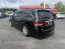 2014 Black /Gray Honda Odyssey EX-L (5FNRL5H6XEB) with an 3.5L V6 SOHC 24V engine, 6-Speed Automatic transmission, located at 547 E. Main St., Orwell, OH, 44076, (440) 437-5893, 41.535435, -80.847855 - This 2014 Honda Odyssey EX-L with Navigation is a well-equipped minivan featuring a 3.5L V6 engine and a 6-speed automatic transmission, delivering up to 27 MPG on the highway. It offers a comfortable ride with leather, heated, and power front seats, tri-zone automatic climate control, and a power m - Photo#9
