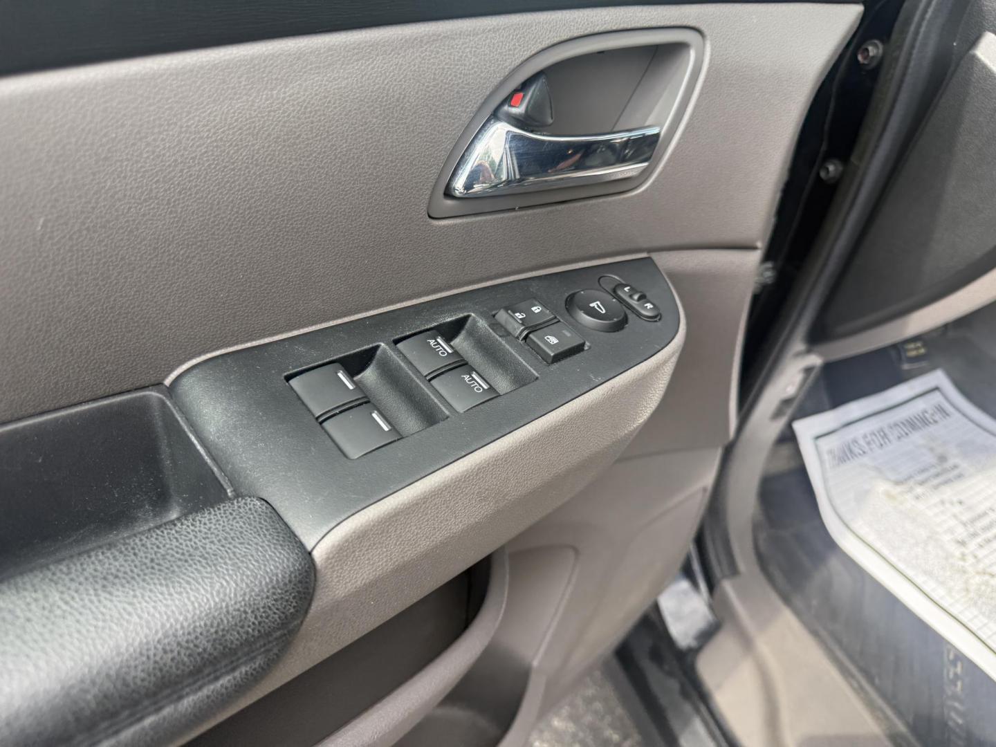 2014 Black /Gray Honda Odyssey EX-L (5FNRL5H6XEB) with an 3.5L V6 SOHC 24V engine, 6-Speed Automatic transmission, located at 547 E. Main St., Orwell, OH, 44076, (440) 437-5893, 41.535435, -80.847855 - This 2014 Honda Odyssey EX-L with Navigation is a well-equipped minivan featuring a 3.5L V6 engine and a 6-speed automatic transmission, delivering up to 27 MPG on the highway. It offers a comfortable ride with leather, heated, and power front seats, tri-zone automatic climate control, and a power m - Photo#17
