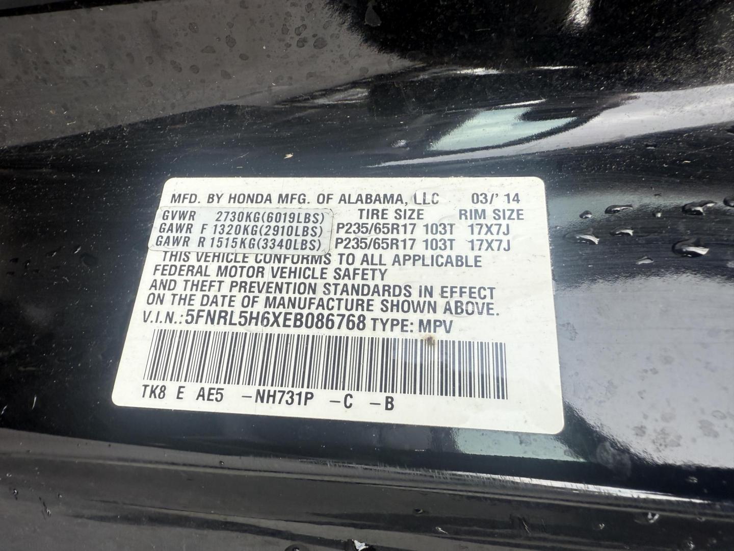2014 Black /Gray Honda Odyssey EX-L (5FNRL5H6XEB) with an 3.5L V6 SOHC 24V engine, 6-Speed Automatic transmission, located at 547 E. Main St., Orwell, OH, 44076, (440) 437-5893, 41.535435, -80.847855 - This 2014 Honda Odyssey EX-L with Navigation is a well-equipped minivan featuring a 3.5L V6 engine and a 6-speed automatic transmission, delivering up to 27 MPG on the highway. It offers a comfortable ride with leather, heated, and power front seats, tri-zone automatic climate control, and a power m - Photo#19