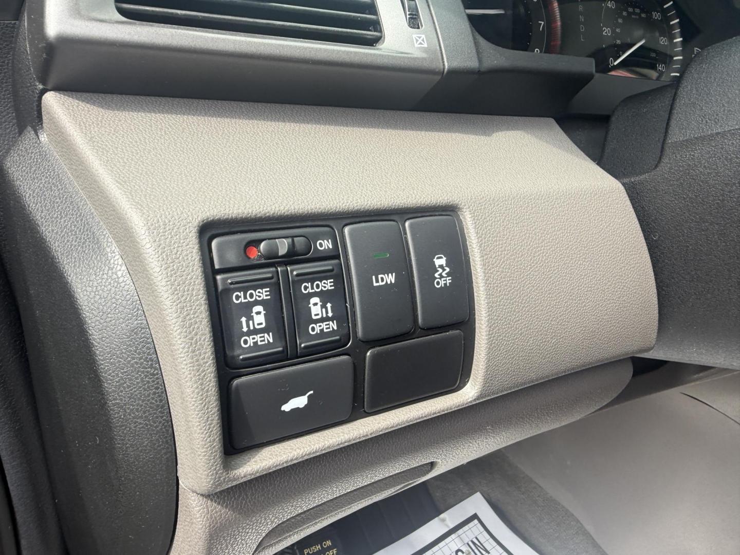 2014 Black /Gray Honda Odyssey EX-L (5FNRL5H6XEB) with an 3.5L V6 SOHC 24V engine, 6-Speed Automatic transmission, located at 547 E. Main St., Orwell, OH, 44076, (440) 437-5893, 41.535435, -80.847855 - This 2014 Honda Odyssey EX-L with Navigation is a well-equipped minivan featuring a 3.5L V6 engine and a 6-speed automatic transmission, delivering up to 27 MPG on the highway. It offers a comfortable ride with leather, heated, and power front seats, tri-zone automatic climate control, and a power m - Photo#21