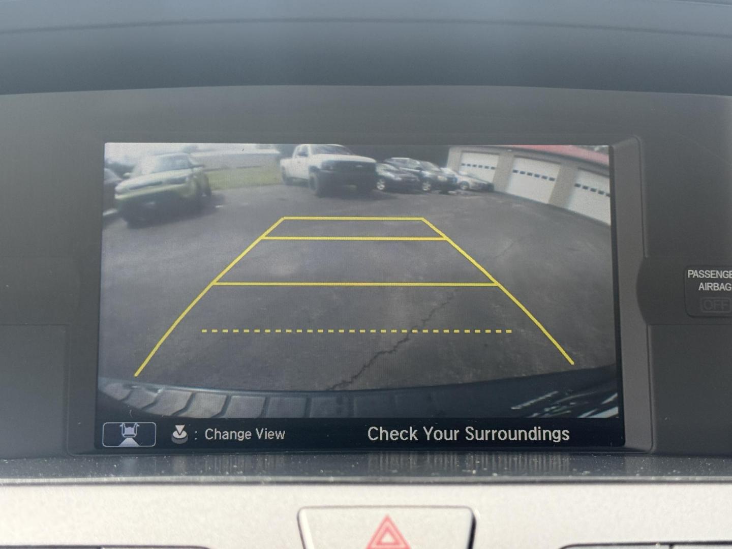 2014 Black /Gray Honda Odyssey EX-L (5FNRL5H6XEB) with an 3.5L V6 SOHC 24V engine, 6-Speed Automatic transmission, located at 547 E. Main St., Orwell, OH, 44076, (440) 437-5893, 41.535435, -80.847855 - This 2014 Honda Odyssey EX-L with Navigation is a well-equipped minivan featuring a 3.5L V6 engine and a 6-speed automatic transmission, delivering up to 27 MPG on the highway. It offers a comfortable ride with leather, heated, and power front seats, tri-zone automatic climate control, and a power m - Photo#26