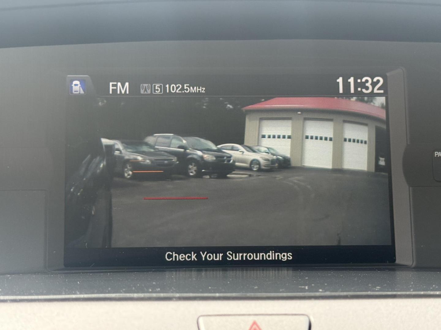 2014 Black /Gray Honda Odyssey EX-L (5FNRL5H6XEB) with an 3.5L V6 SOHC 24V engine, 6-Speed Automatic transmission, located at 547 E. Main St., Orwell, OH, 44076, (440) 437-5893, 41.535435, -80.847855 - This 2014 Honda Odyssey EX-L with Navigation is a well-equipped minivan featuring a 3.5L V6 engine and a 6-speed automatic transmission, delivering up to 27 MPG on the highway. It offers a comfortable ride with leather, heated, and power front seats, tri-zone automatic climate control, and a power m - Photo#27